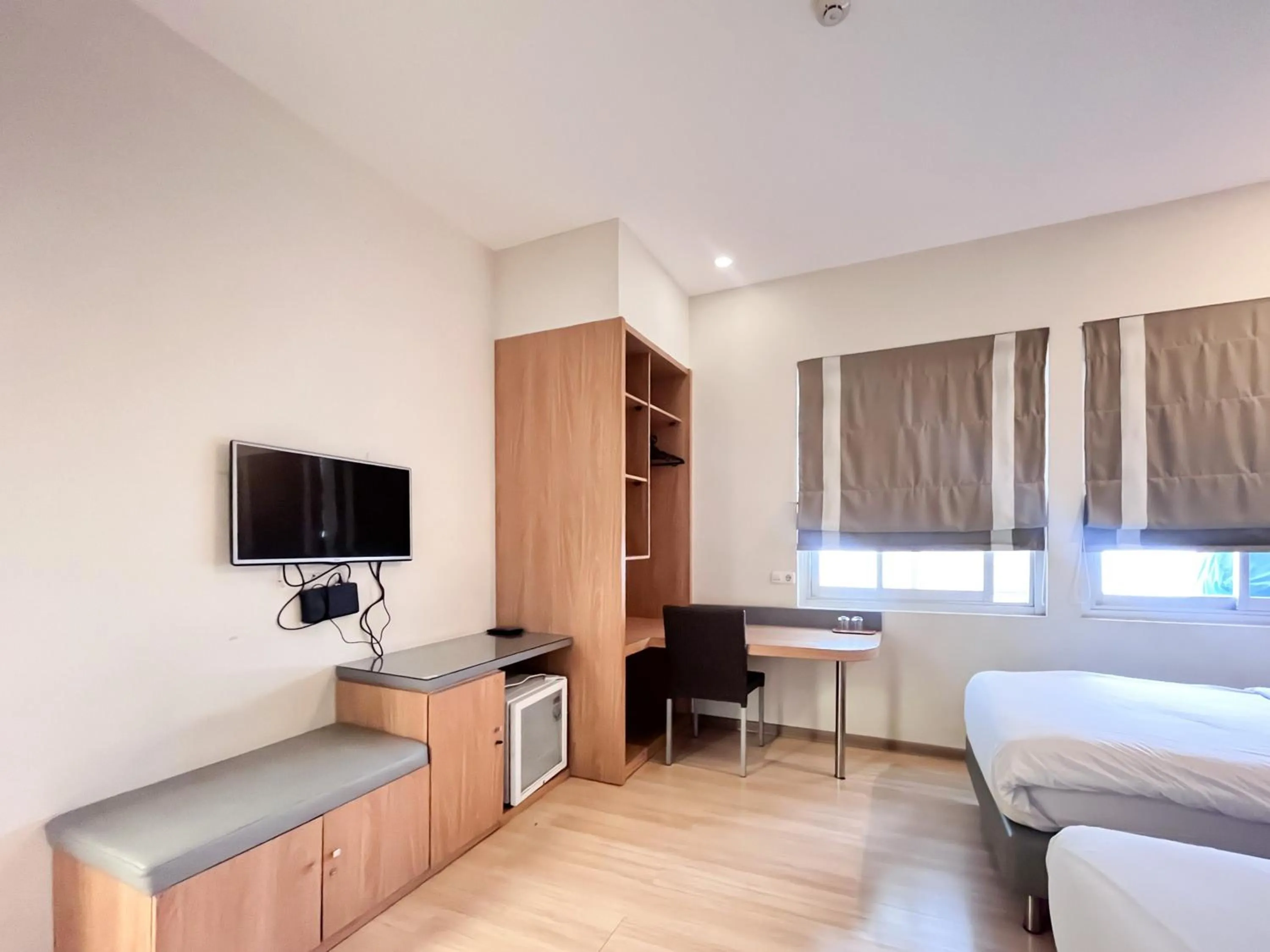 Bedroom, Bed in Sans Vibes Hotel Syariah Graha 100 Gubeng Surabaya