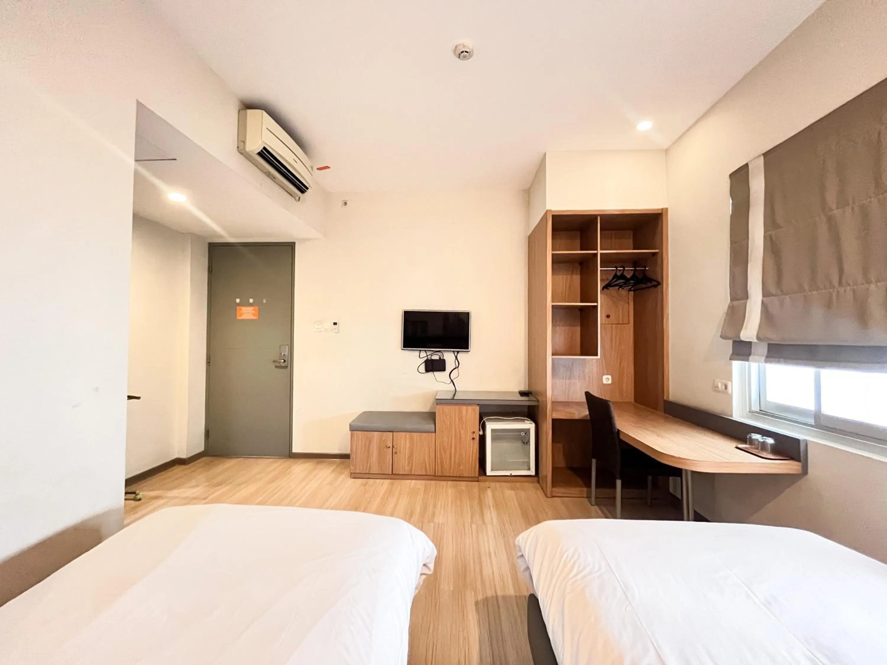 Bedroom, Bed in Sans Vibes Hotel Syariah Graha 100 Gubeng Surabaya