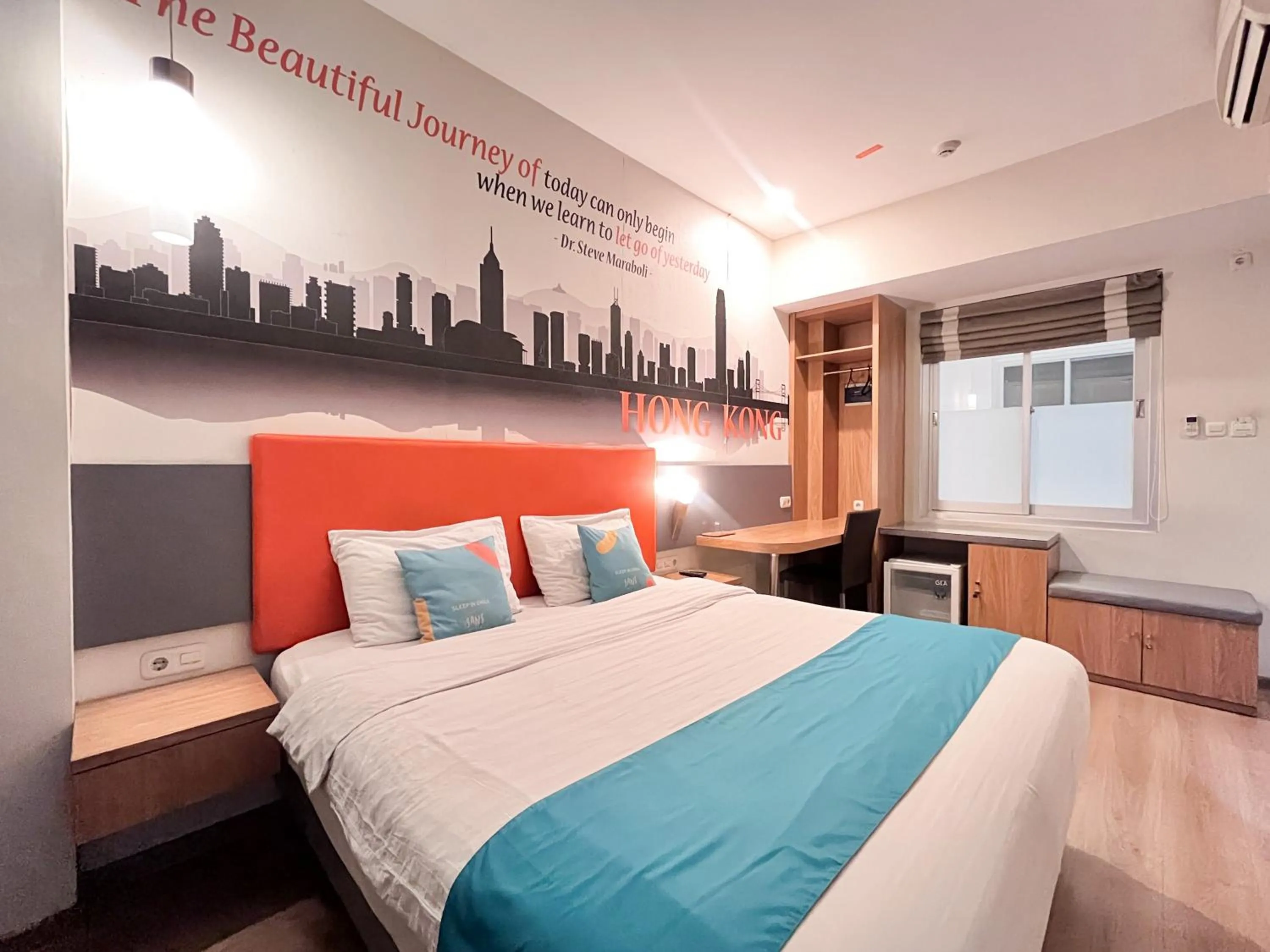 Bedroom, Bed in Sans Vibes Hotel Syariah Graha 100 Gubeng Surabaya