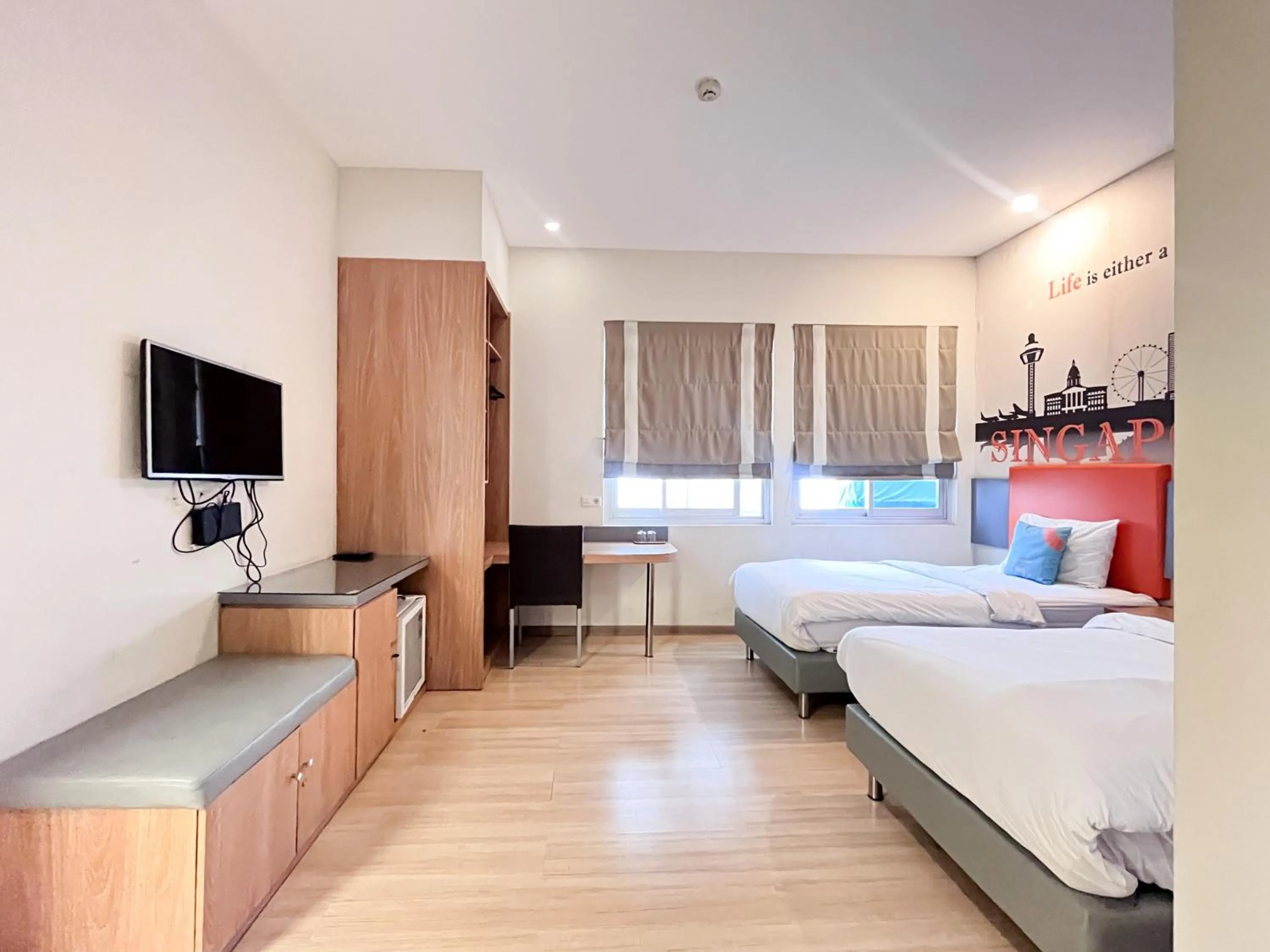 Bedroom, Bed in Sans Vibes Hotel Syariah Graha 100 Gubeng Surabaya