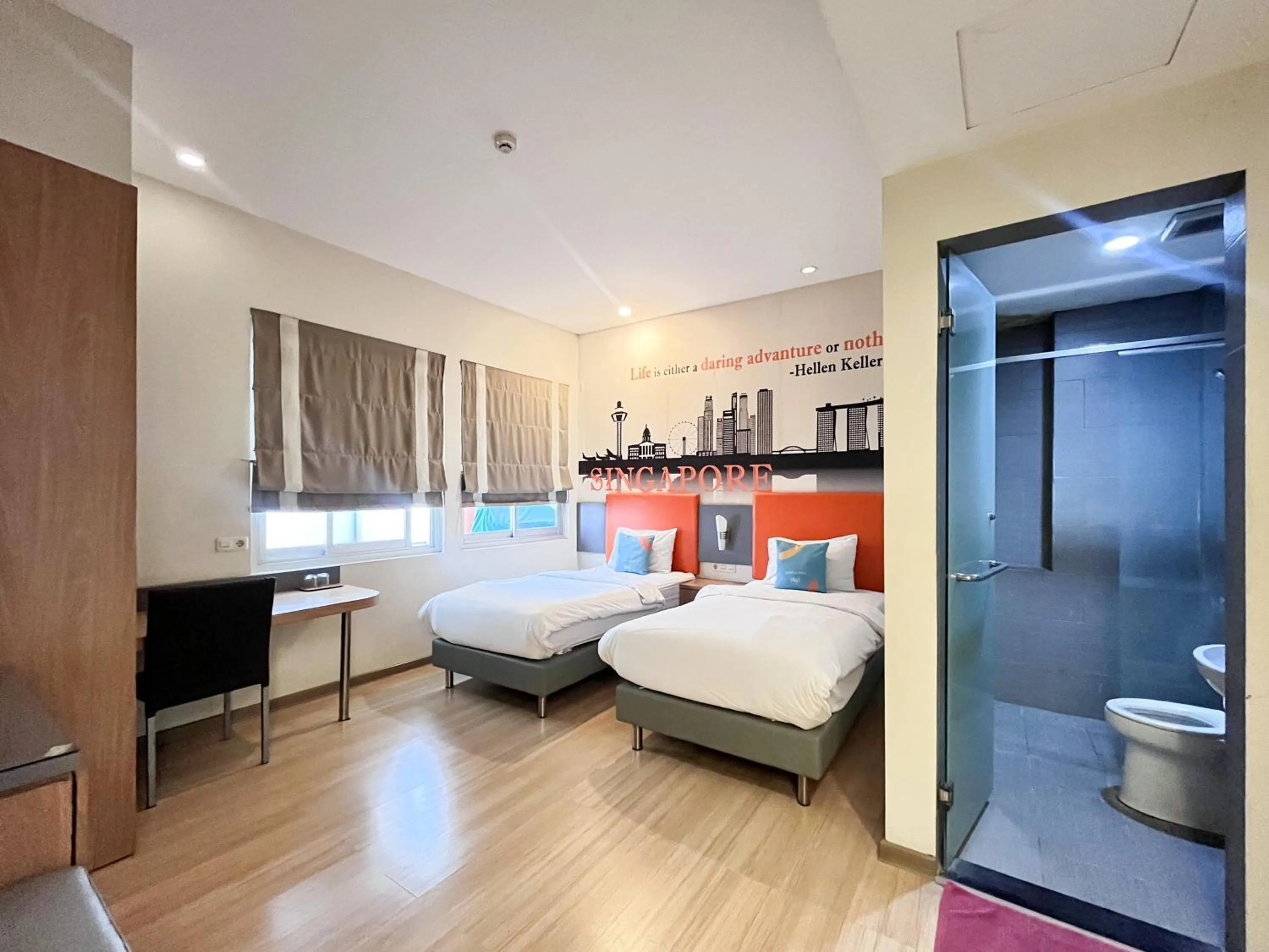 Bedroom, Bed in Sans Vibes Hotel Syariah Graha 100 Gubeng Surabaya