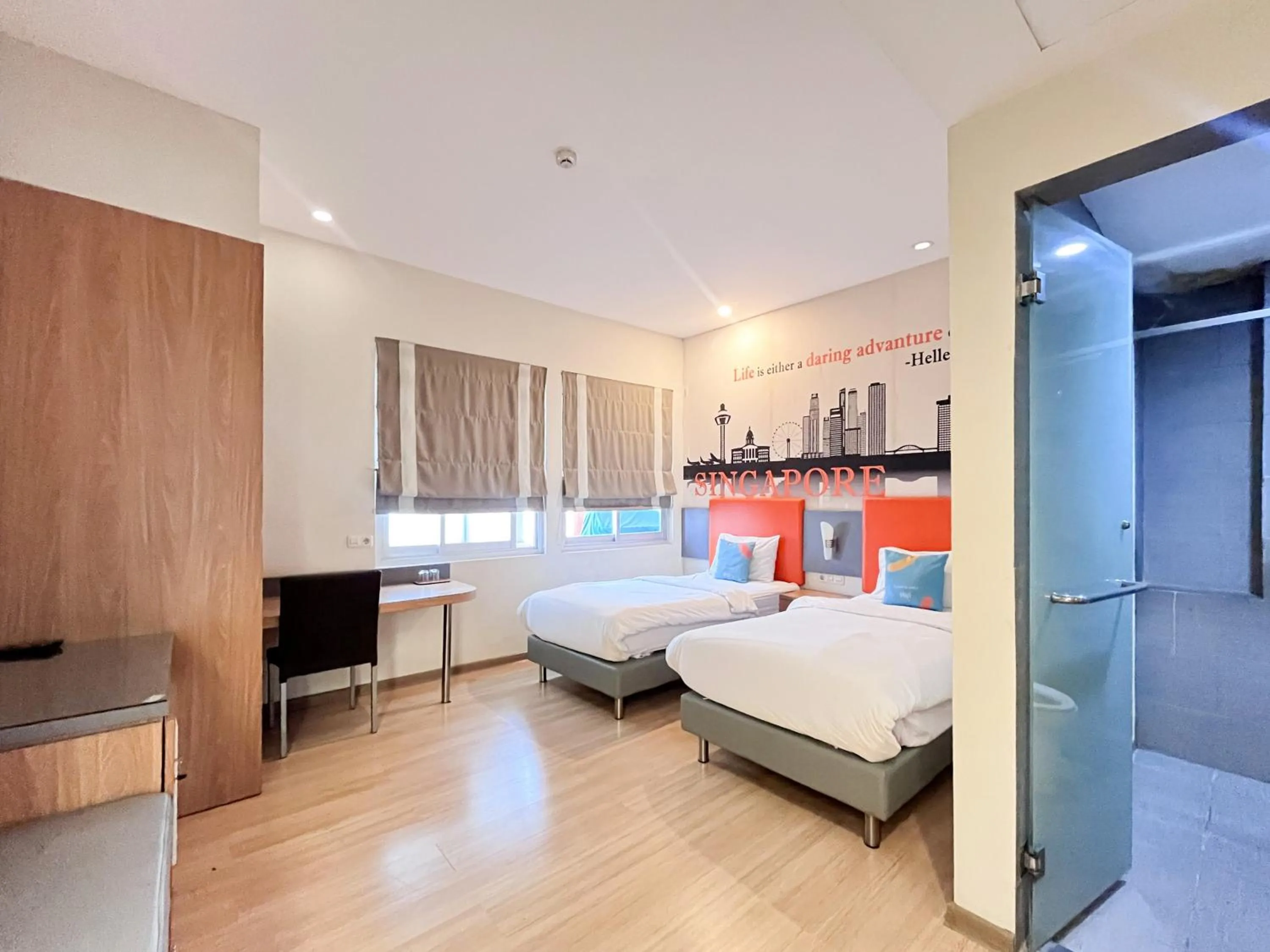 Bedroom, Bed in Sans Vibes Hotel Syariah Graha 100 Gubeng Surabaya