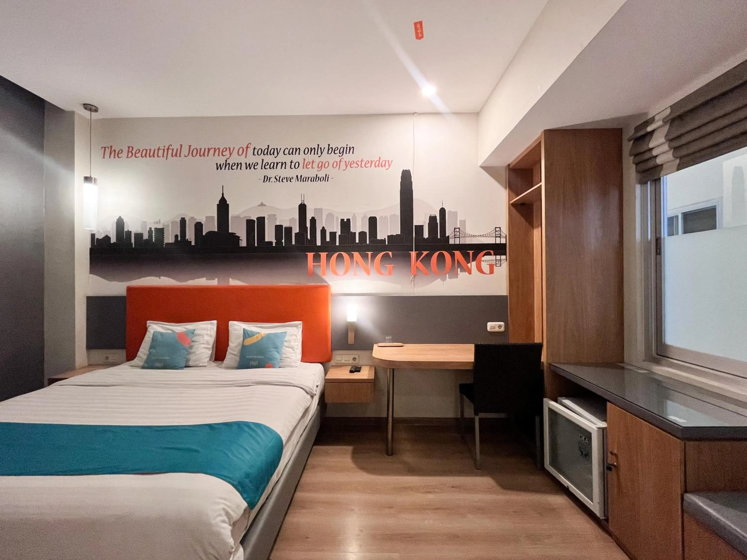 Bedroom, Bed in Sans Vibes Hotel Syariah Graha 100 Gubeng Surabaya