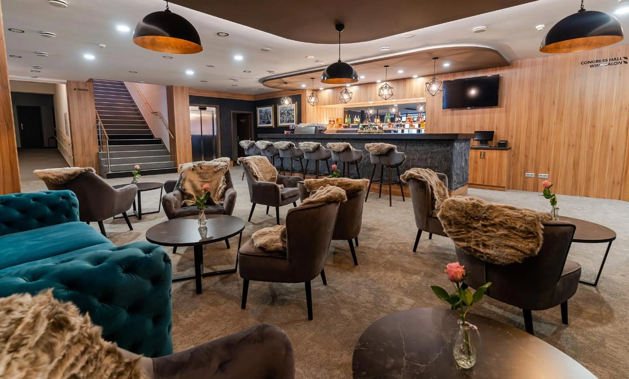 Communal lounge/ TV room in Wellness Hotel Demänová