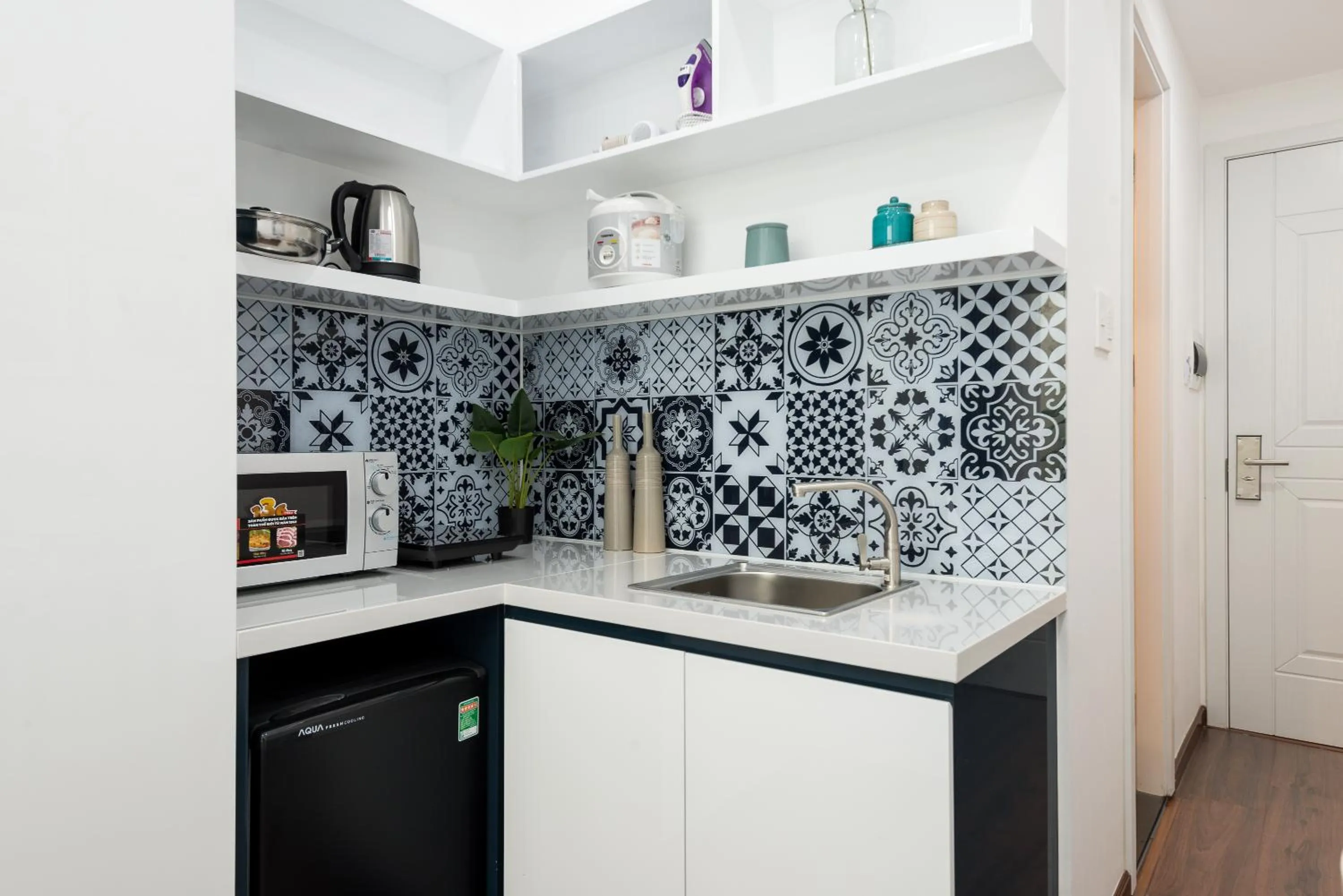 Kitchen or kitchenette in Cozrum Homes The Gallery Residence