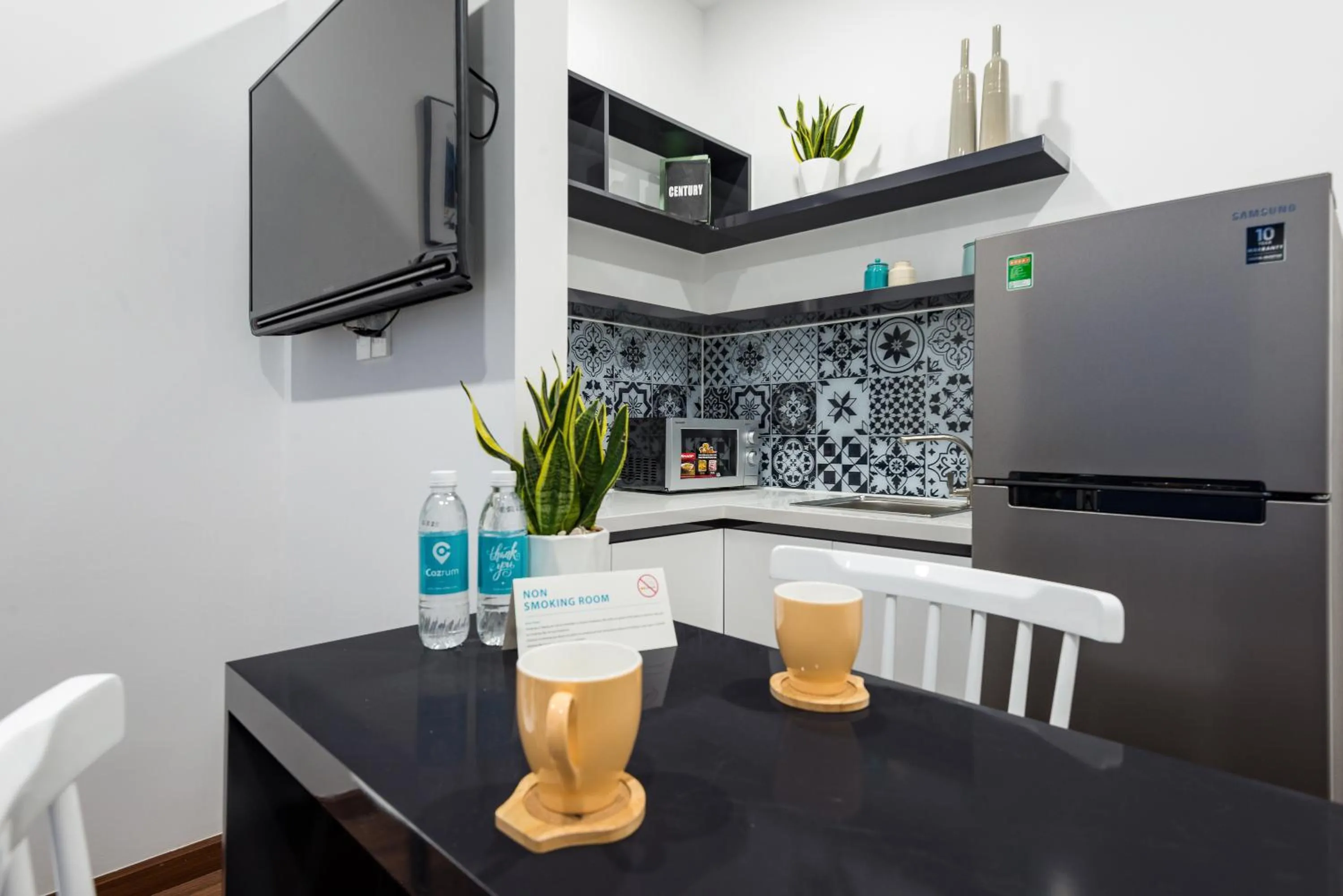 Dining area in Cozrum Homes The Gallery Residence