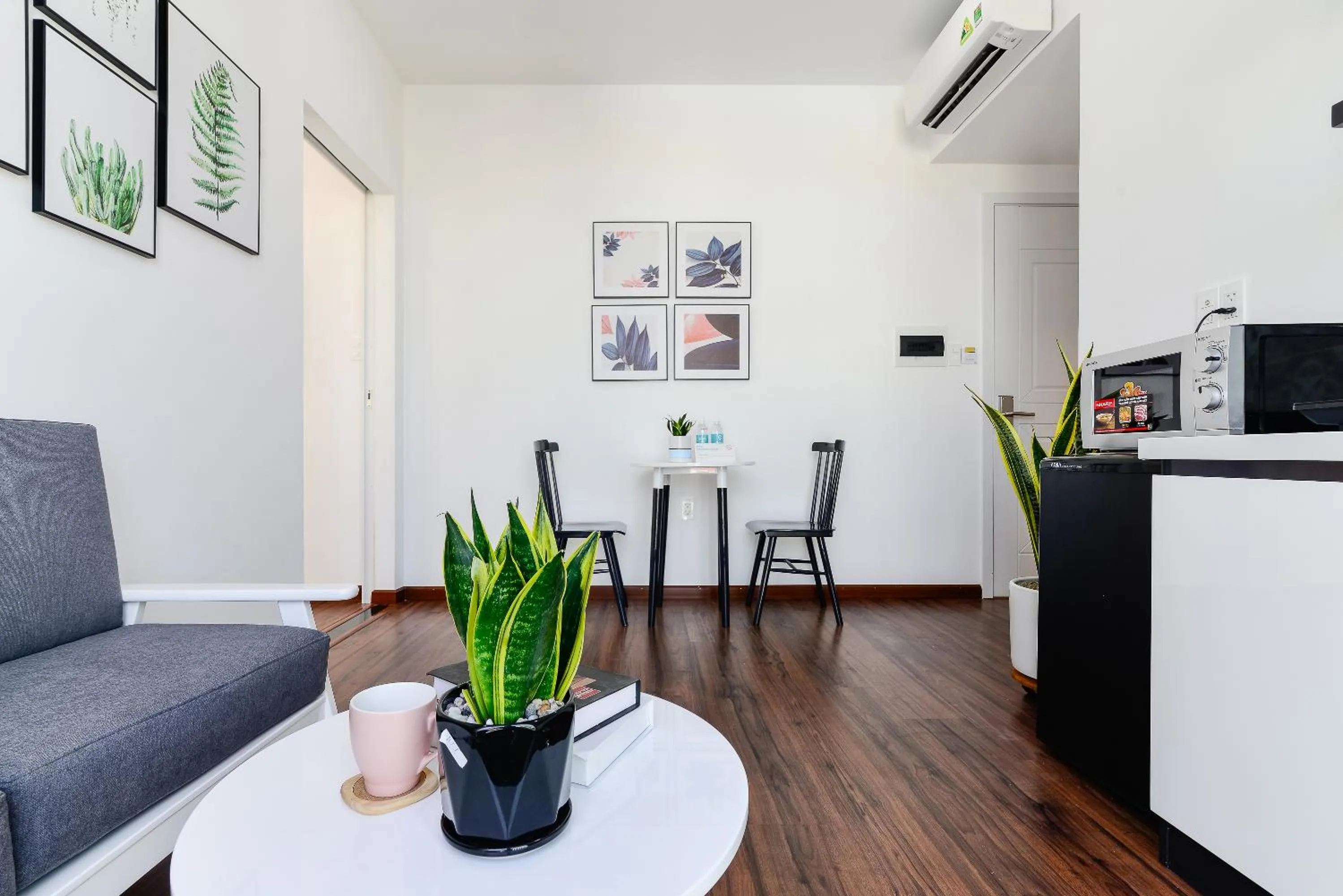 Living room in Cozrum Homes The Gallery Residence