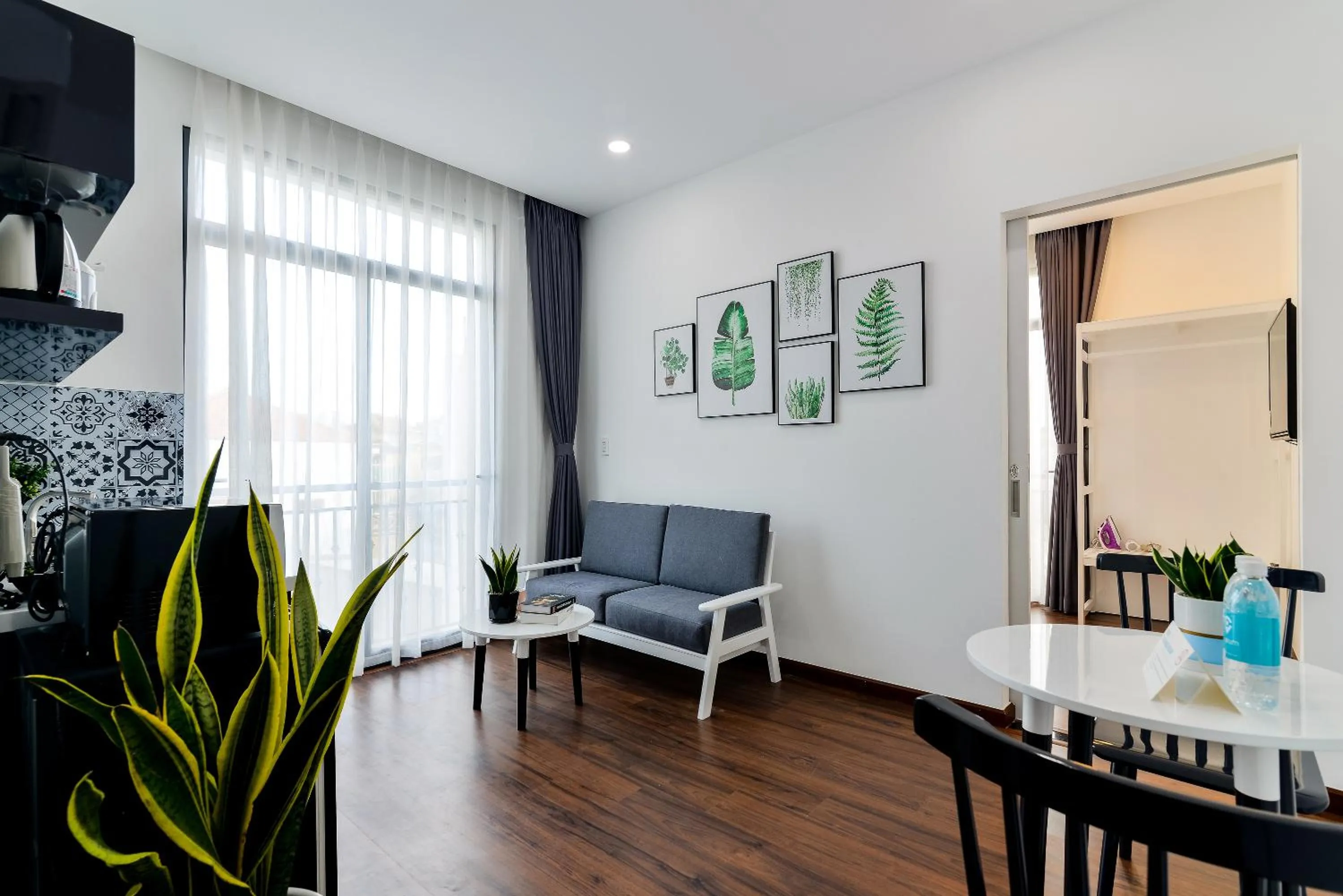 Living room in Cozrum Homes The Gallery Residence