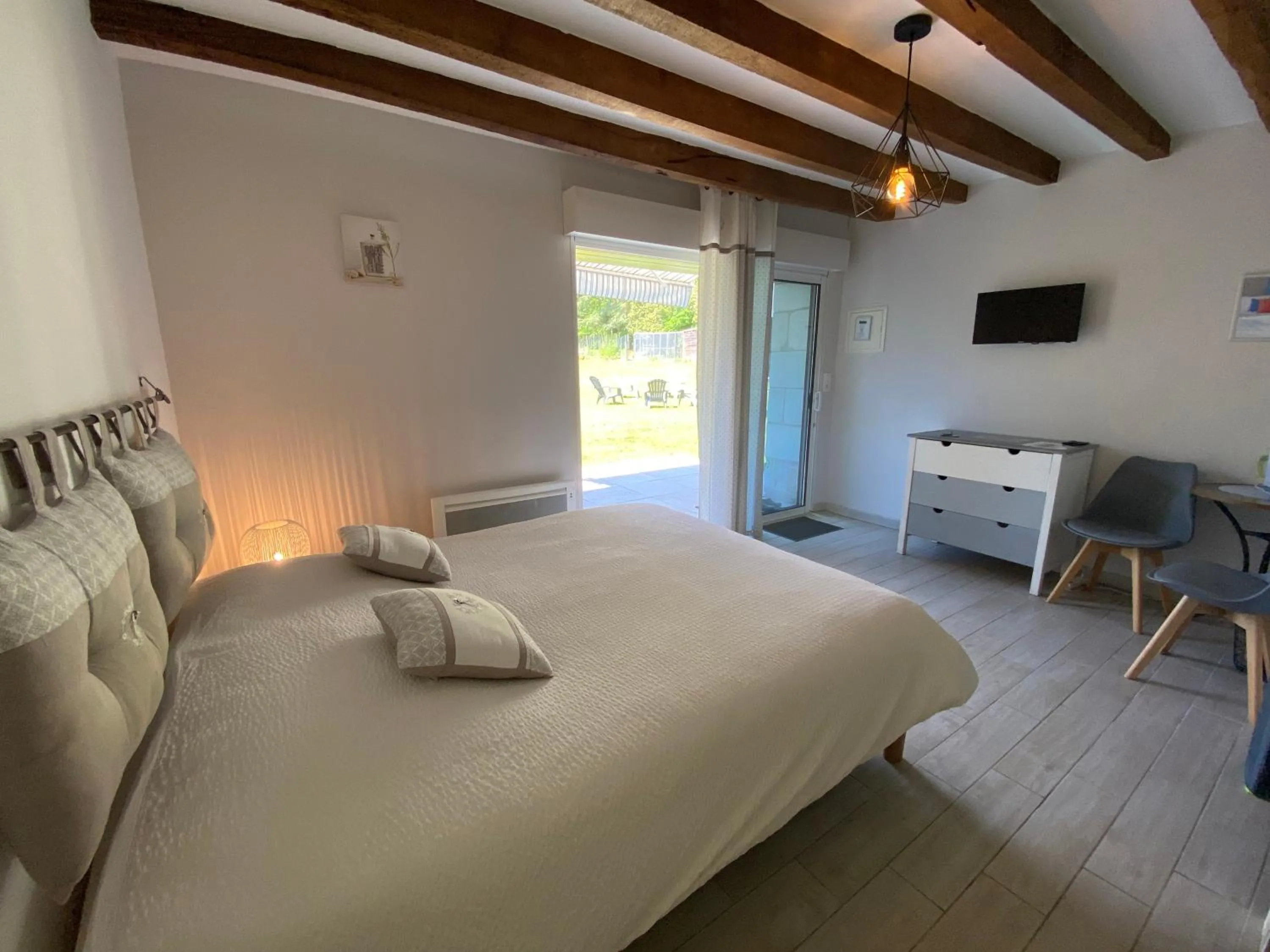 Bed in Les Mariniers Chambres d'Hôtes -Guest House - Bain nordique en option