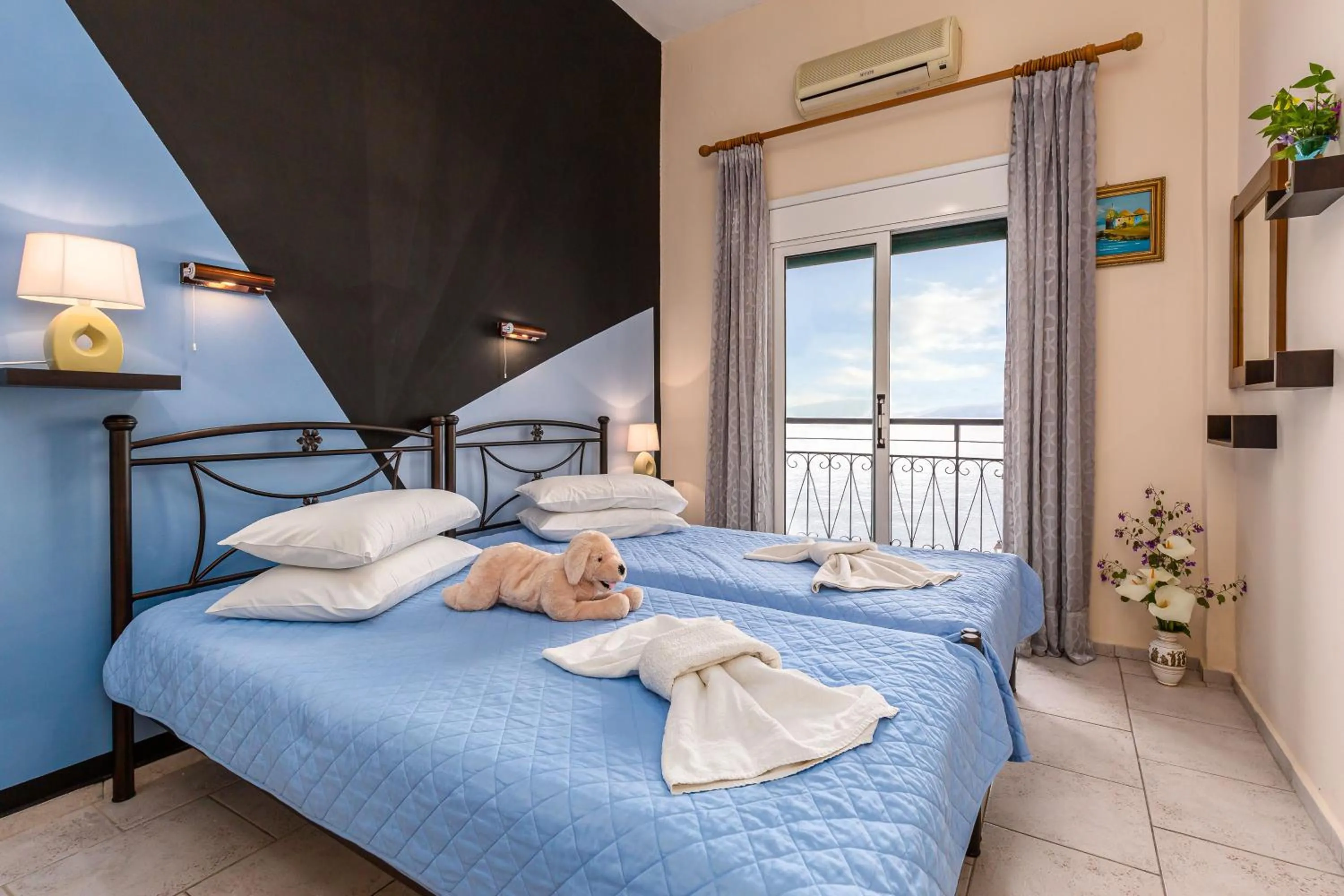 Bed in Riviera Seaside Hotel by Estia