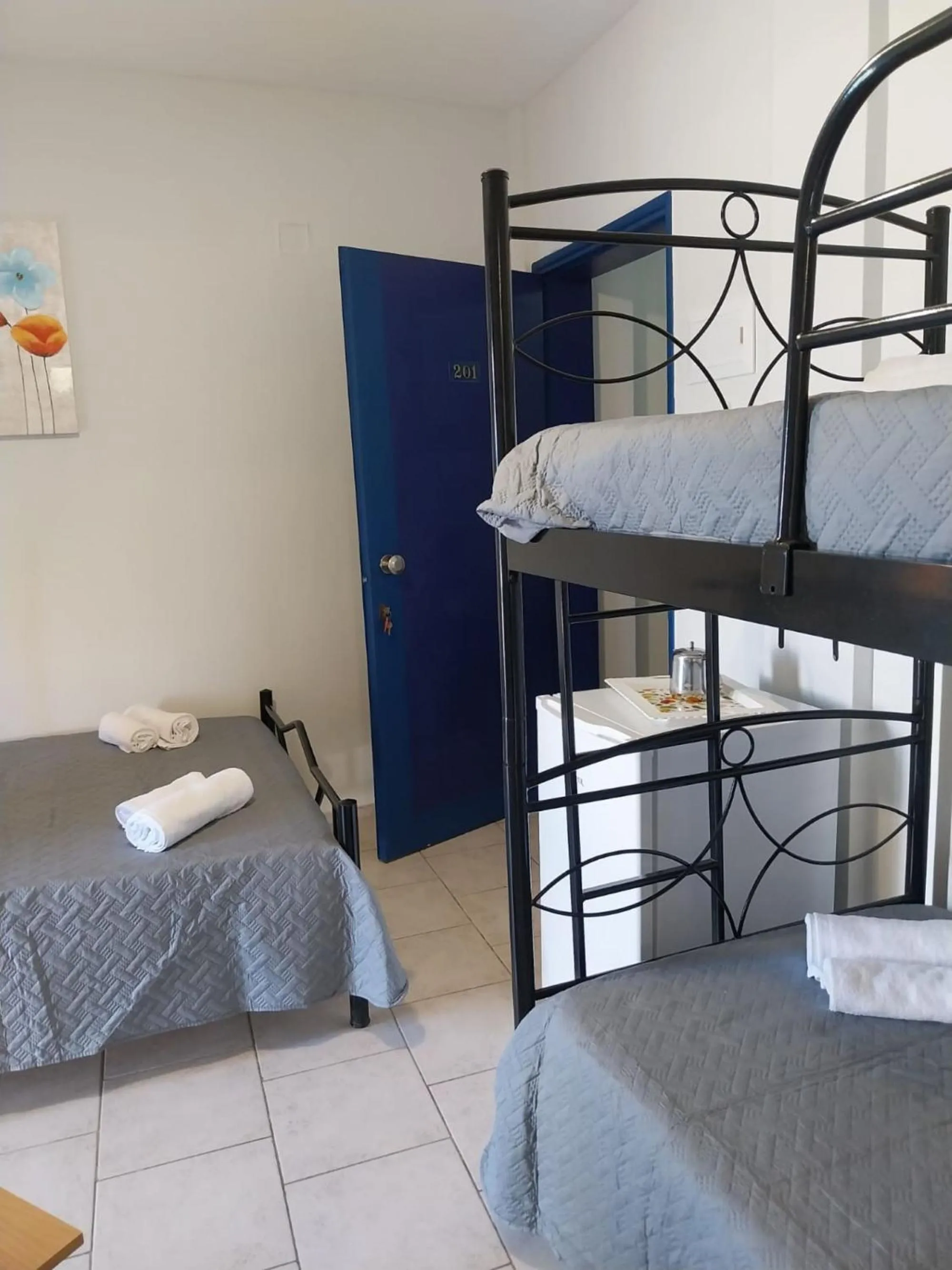 Bed in Riviera Seaside Hotel by Estia