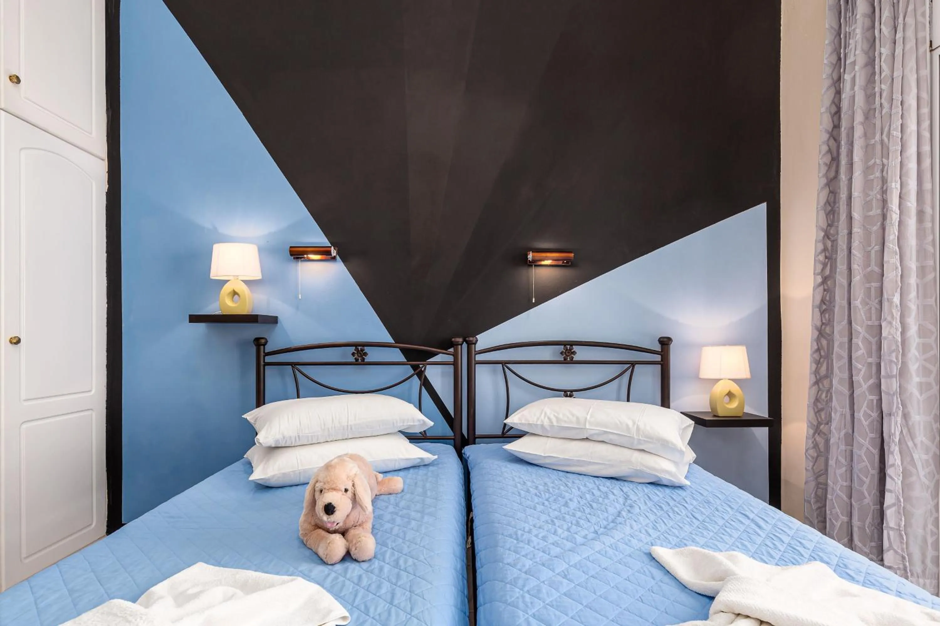 Bed in Riviera Seaside Hotel by Estia