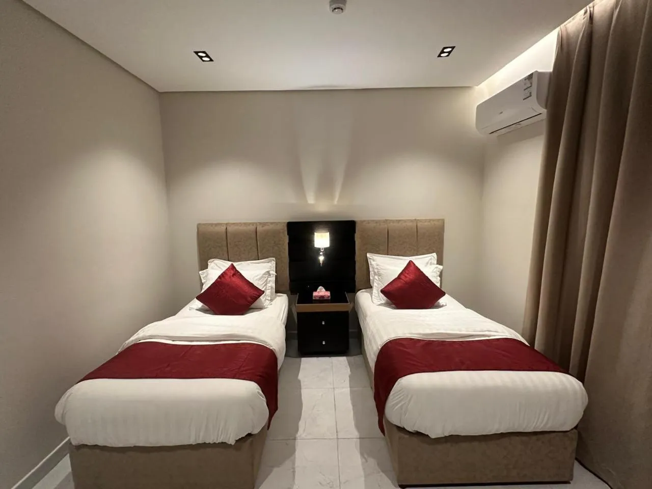 Photo of the whole room, Bed in Golden Galaxies Furnished Units