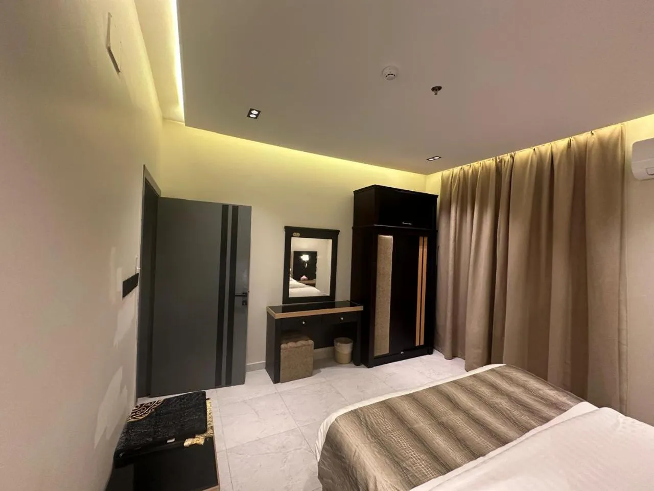 Bed in Golden Galaxies Furnished Units