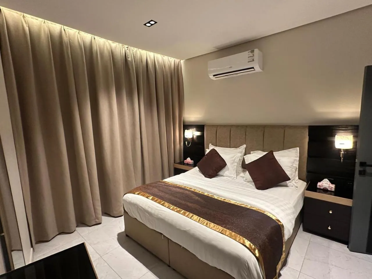 Bed in Golden Galaxies Furnished Units