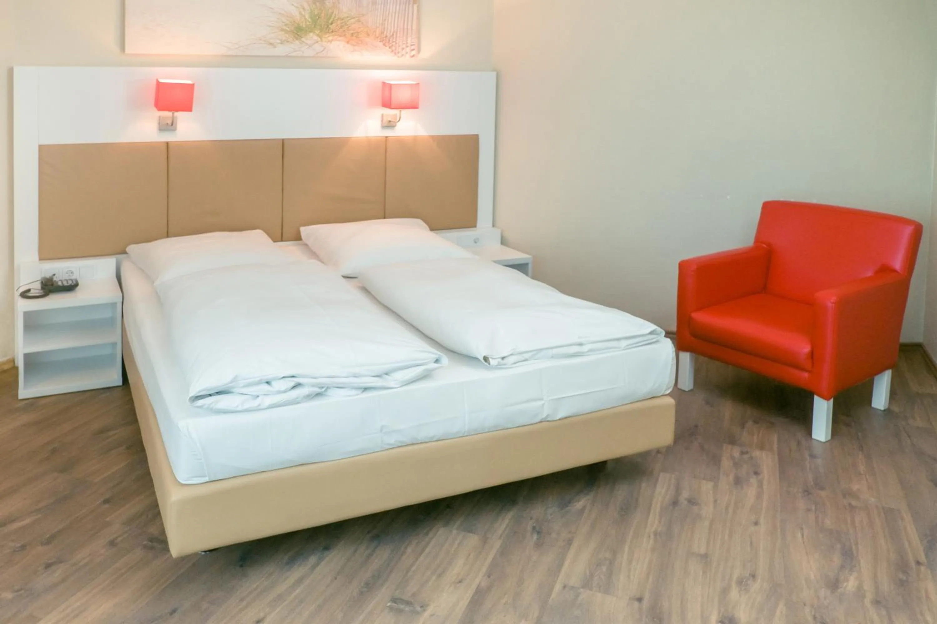 Photo of the whole room, Bed in Hotel Stuttgart Sindelfingen City by Tulip Inn