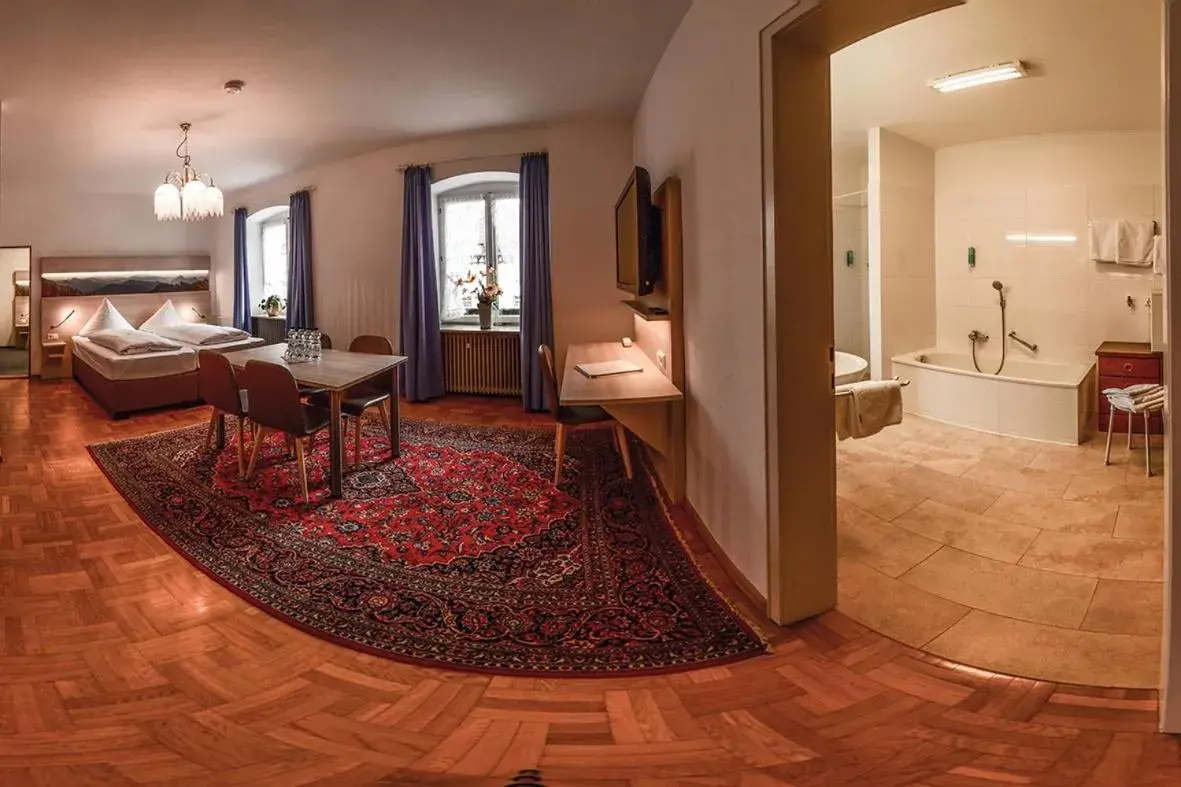 Quadruple Room with Balcony - single occupancy in Hotel Hirschen Quadruple Room with Balcony - single occupancy in Hotel Hirschen