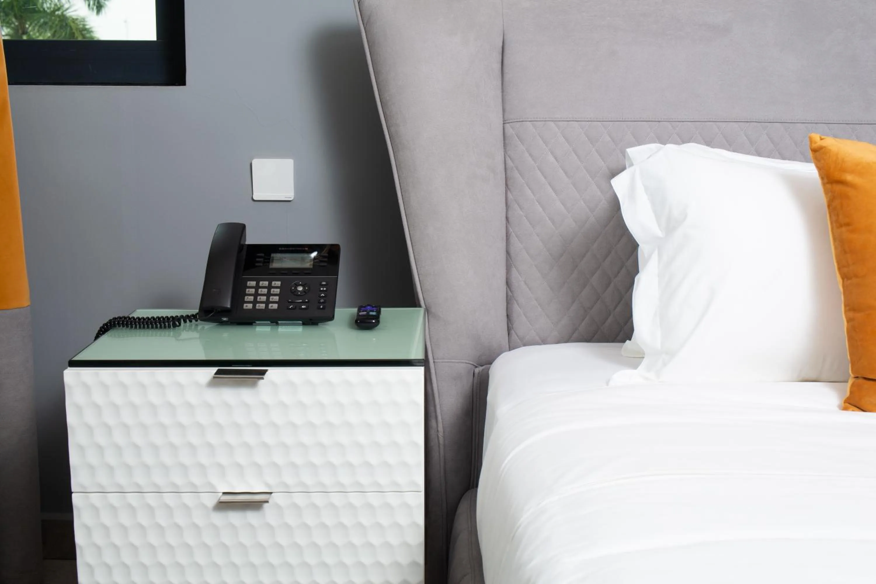 Bed in The Alima Suites