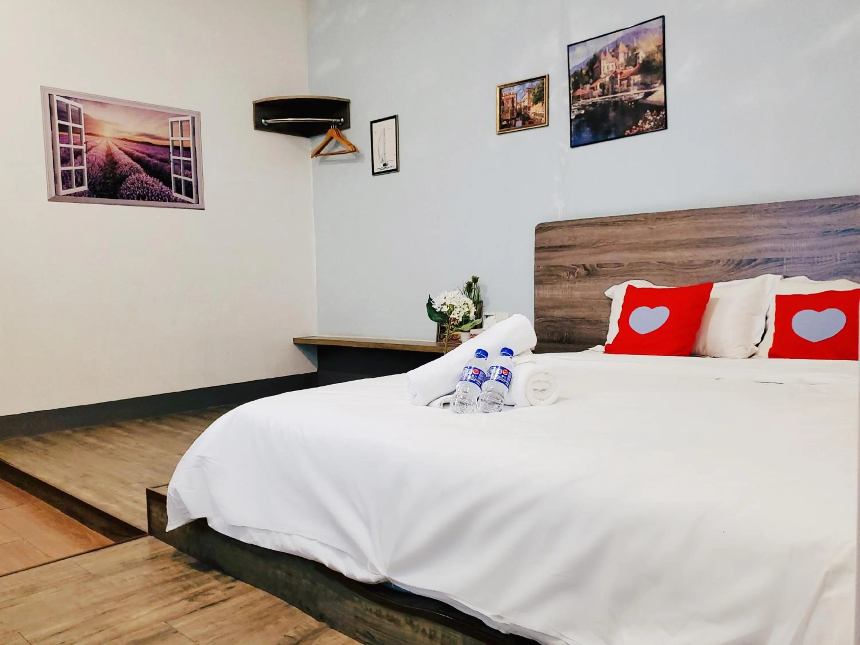 Bed in Winggarden Murals House by JE Boutique Guesthouse