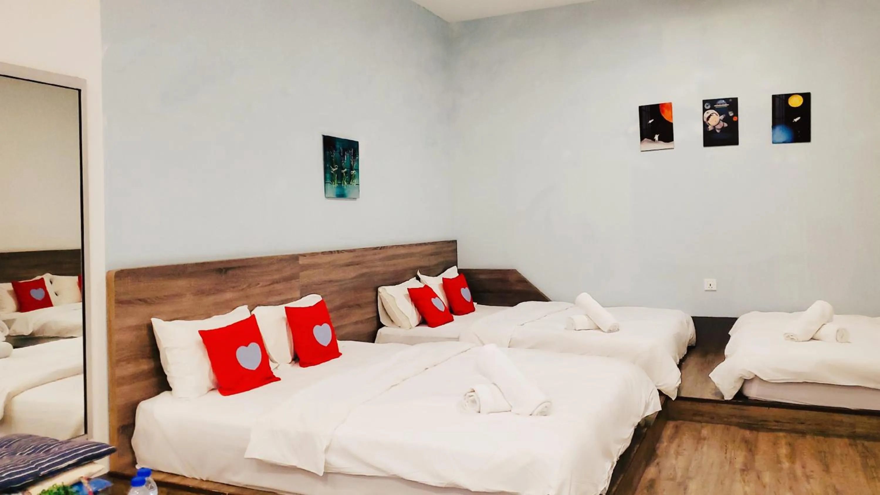 Bed in Winggarden Murals House by JE Boutique Guesthouse