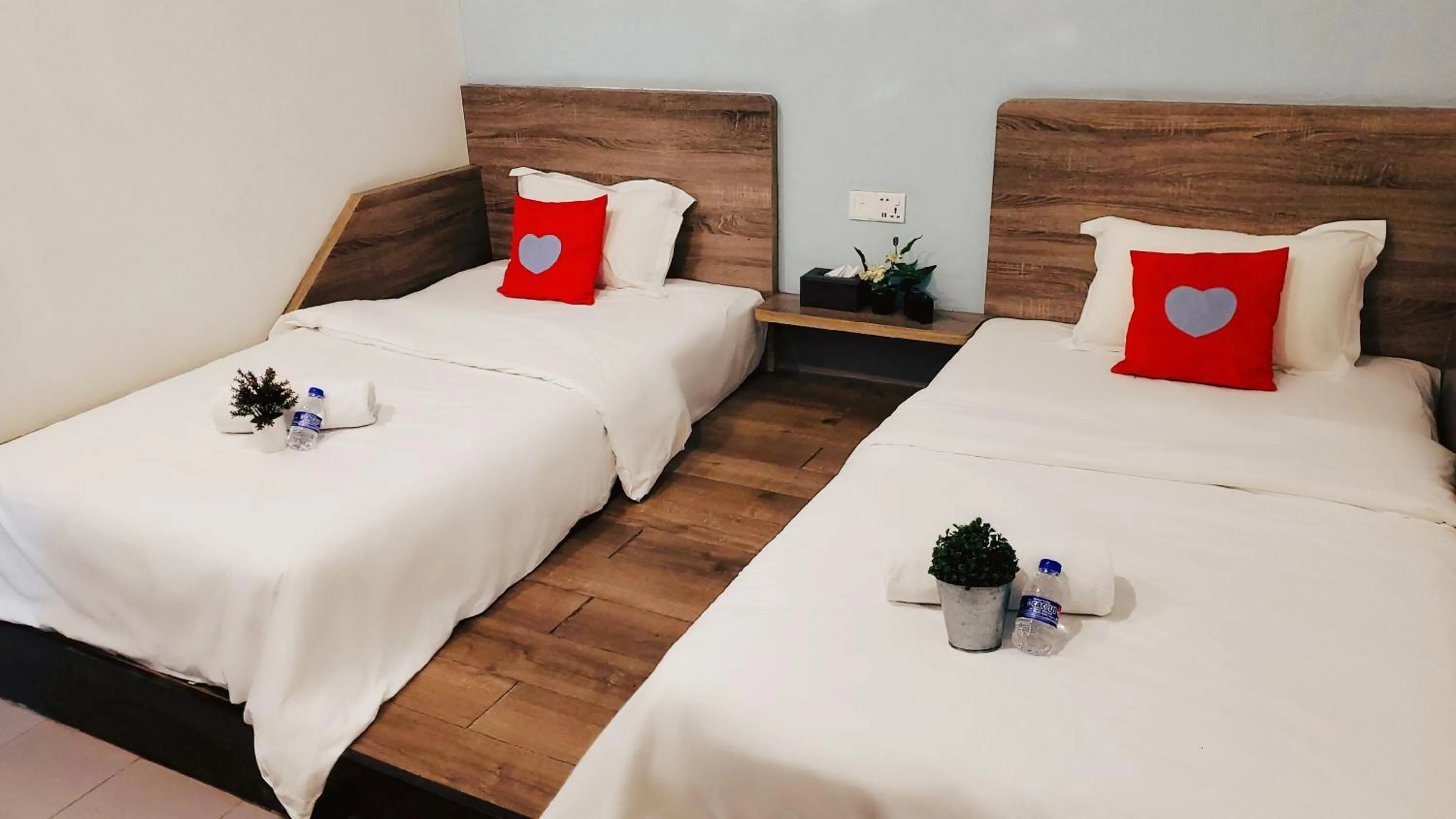 Bed in Winggarden Murals House by JE Boutique Guesthouse