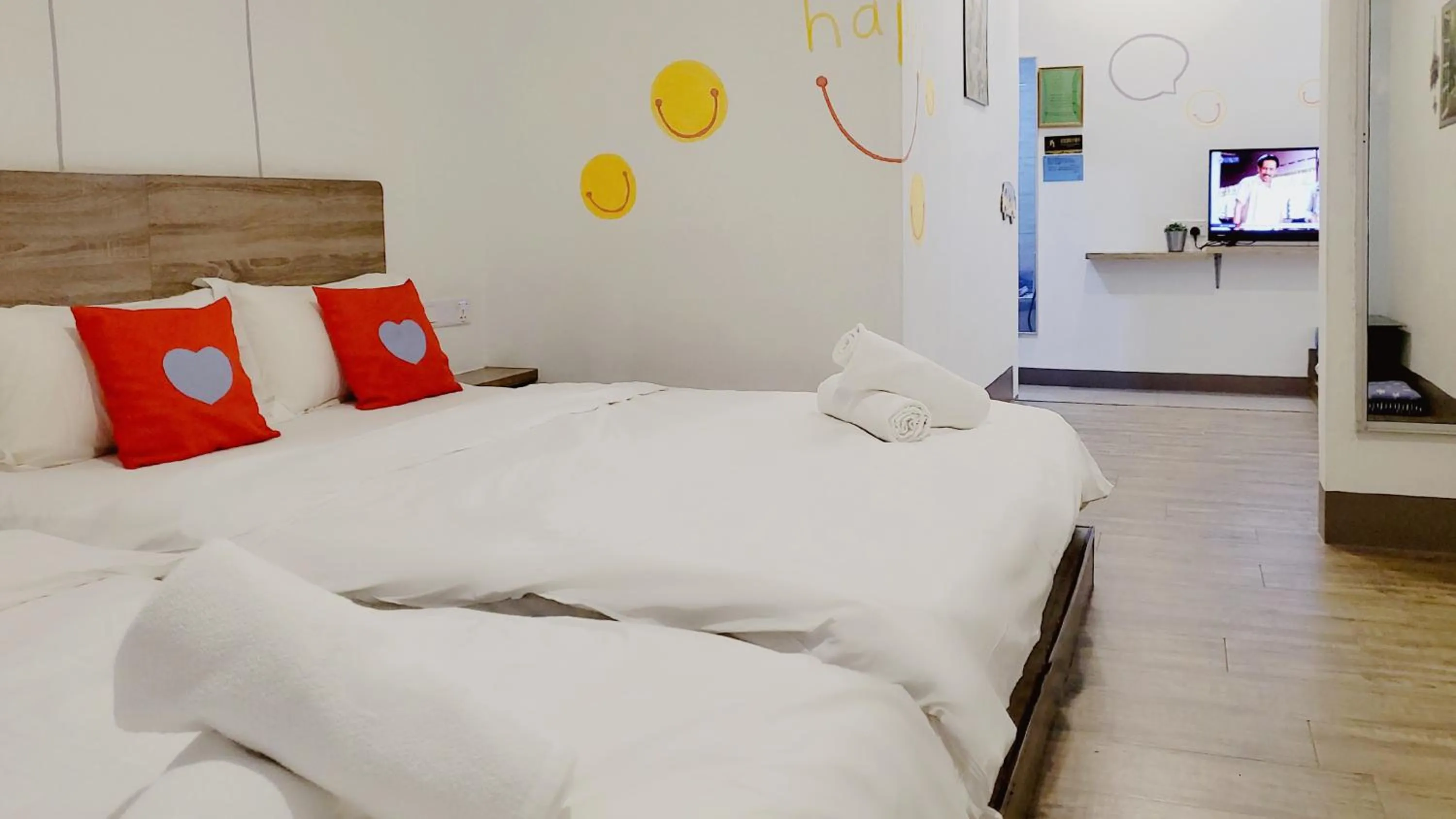 Bed in Winggarden Murals House by JE Boutique Guesthouse