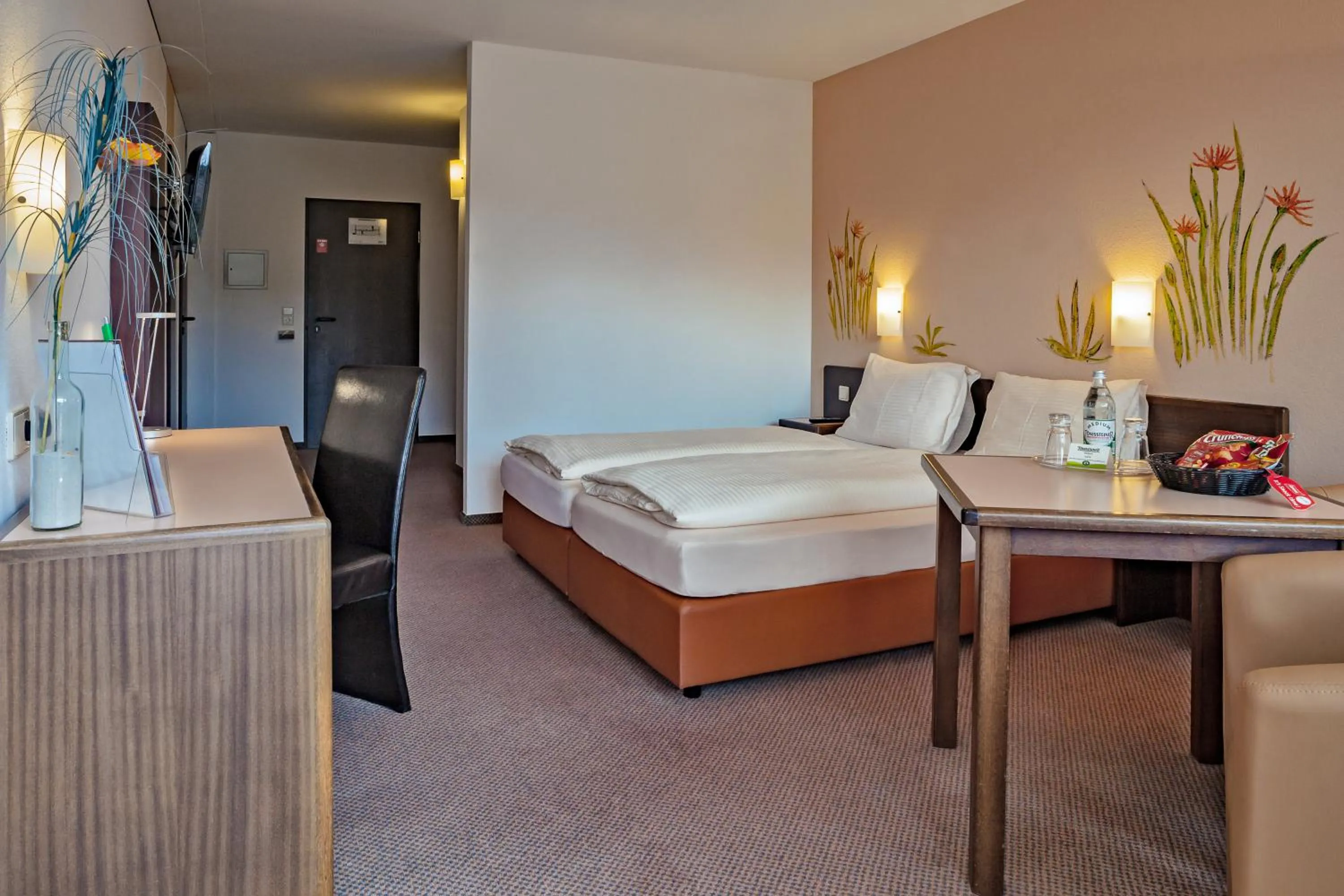 Living room, Bed in Hotelpark der Westerwald Treff