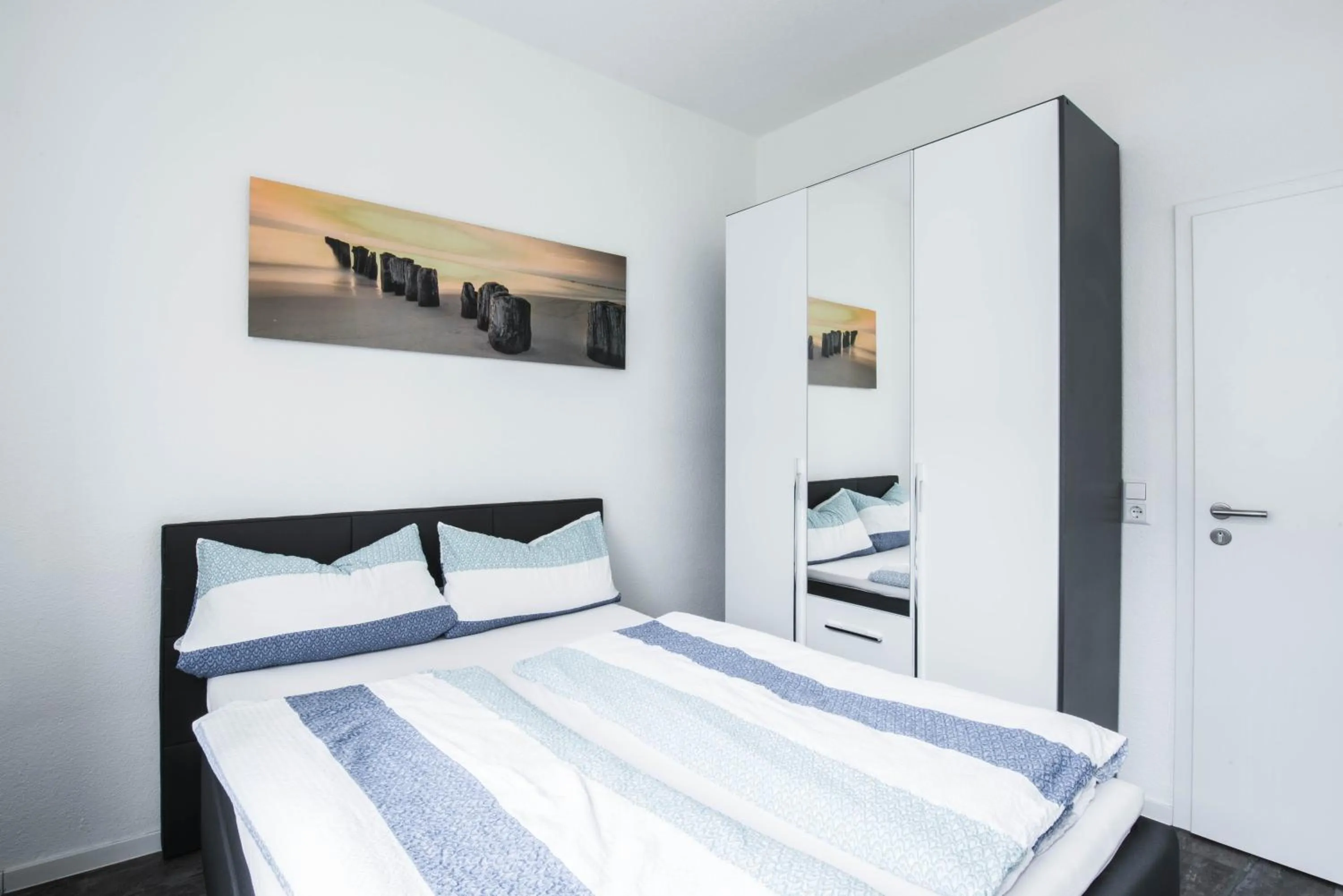 Decorative detail, Bed in Central Apartments Aalen