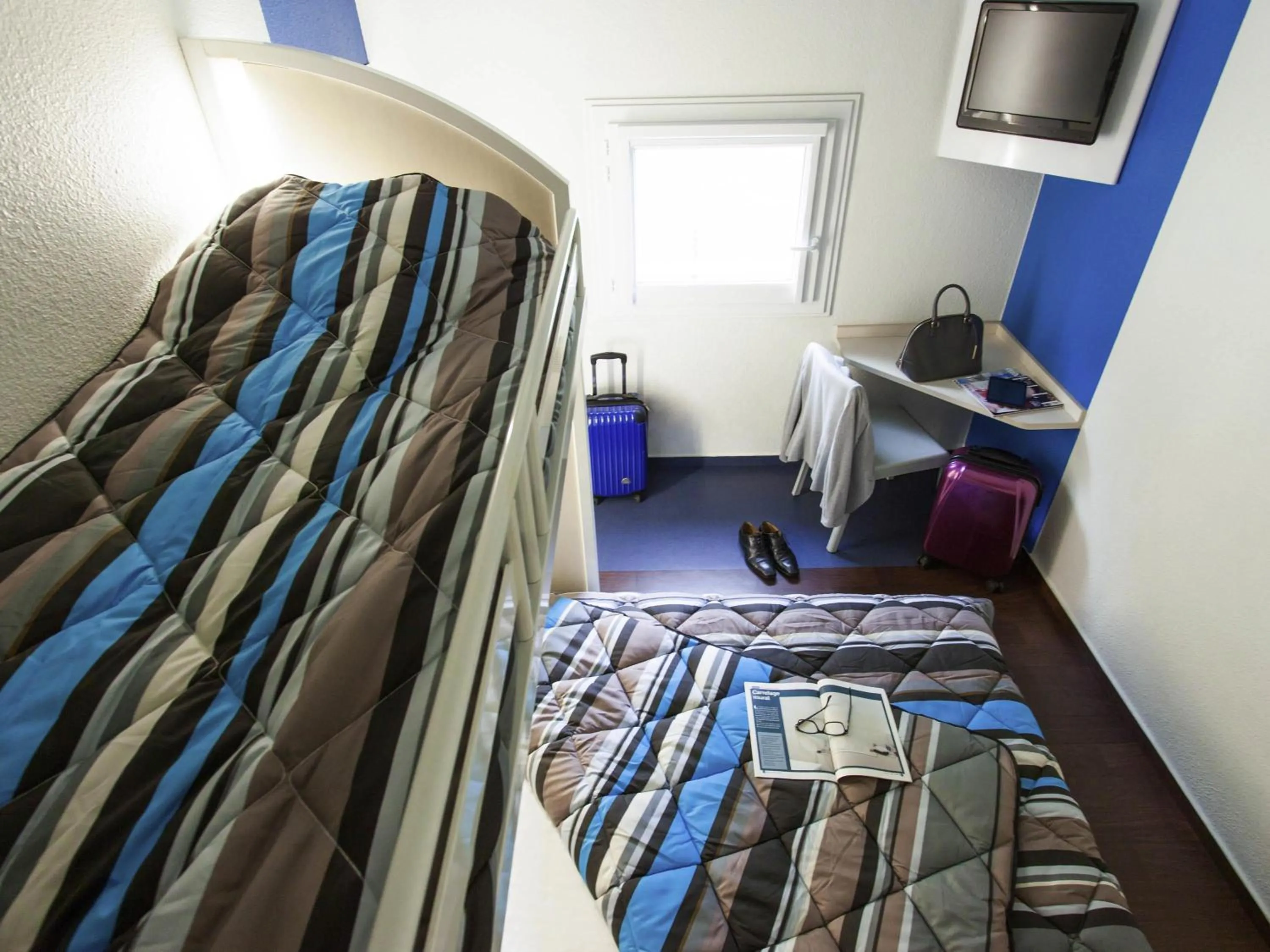 Bedroom, Bed in hotelF1 Les Ulis Courtaboeuf