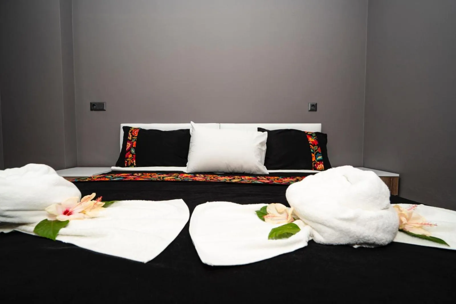 Bed in ESQUIRE HOTELS and LOUNGES