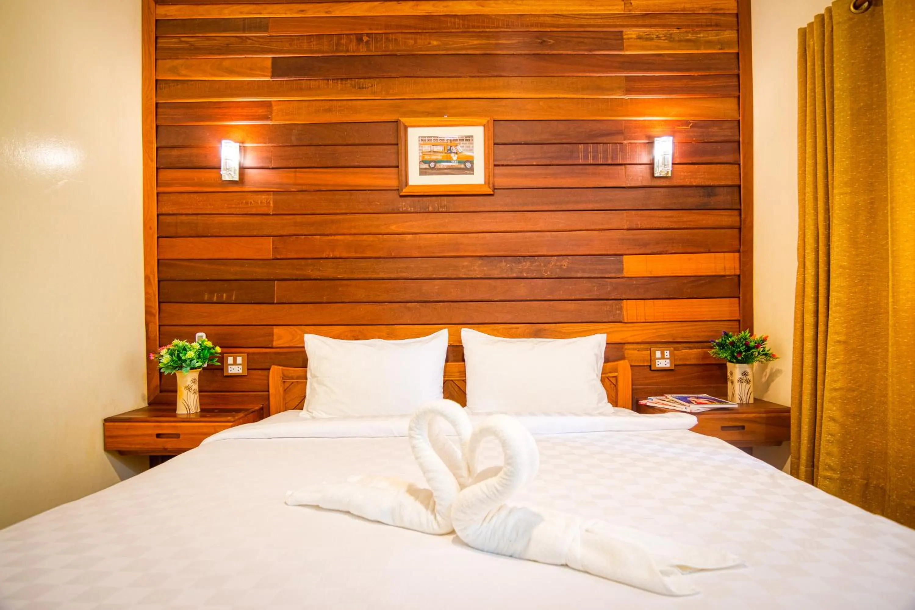 Photo of the whole room, Bed in Nonnee Lampang Hotel