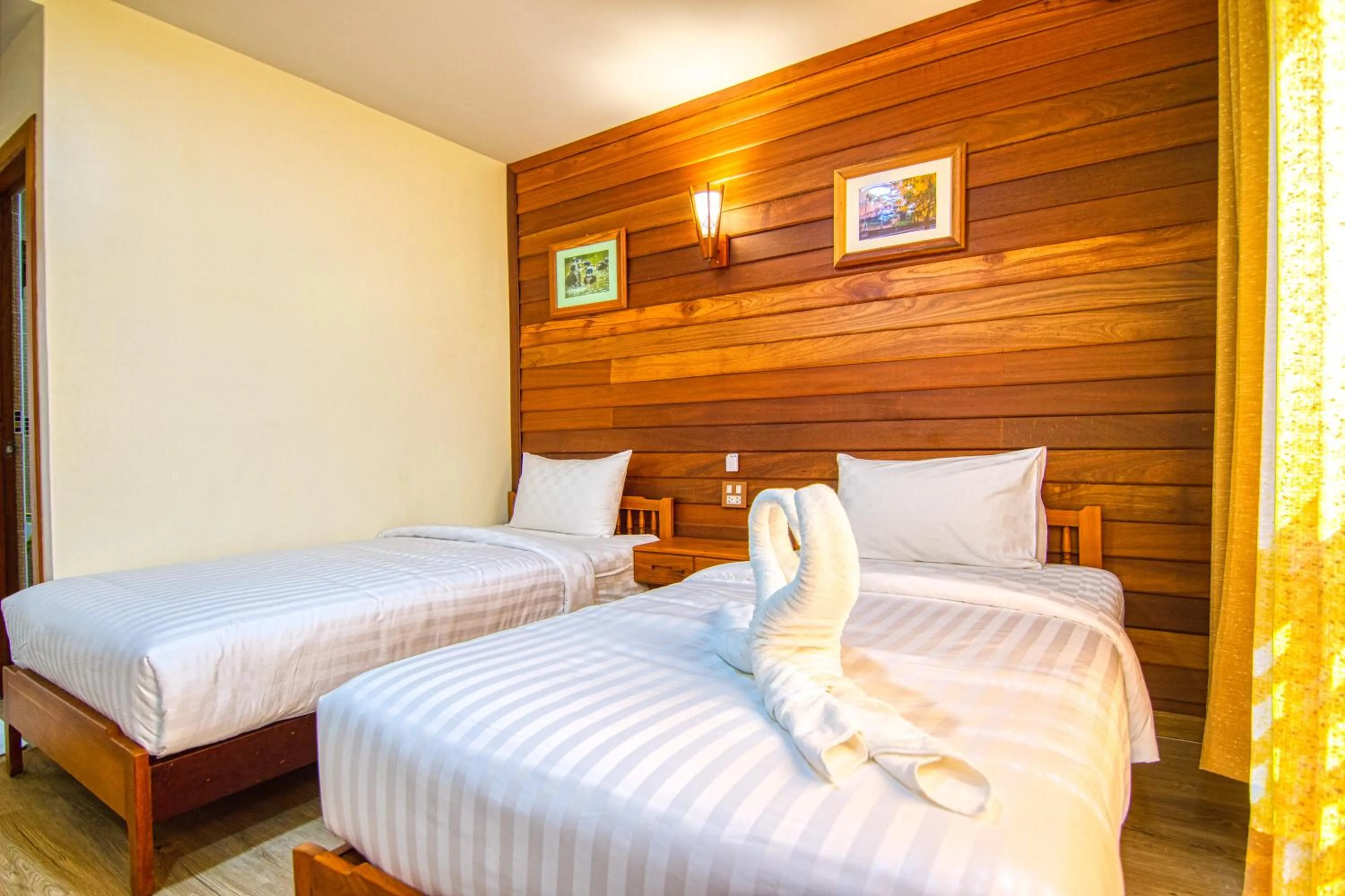 Photo of the whole room, Bed in Nonnee Lampang Hotel