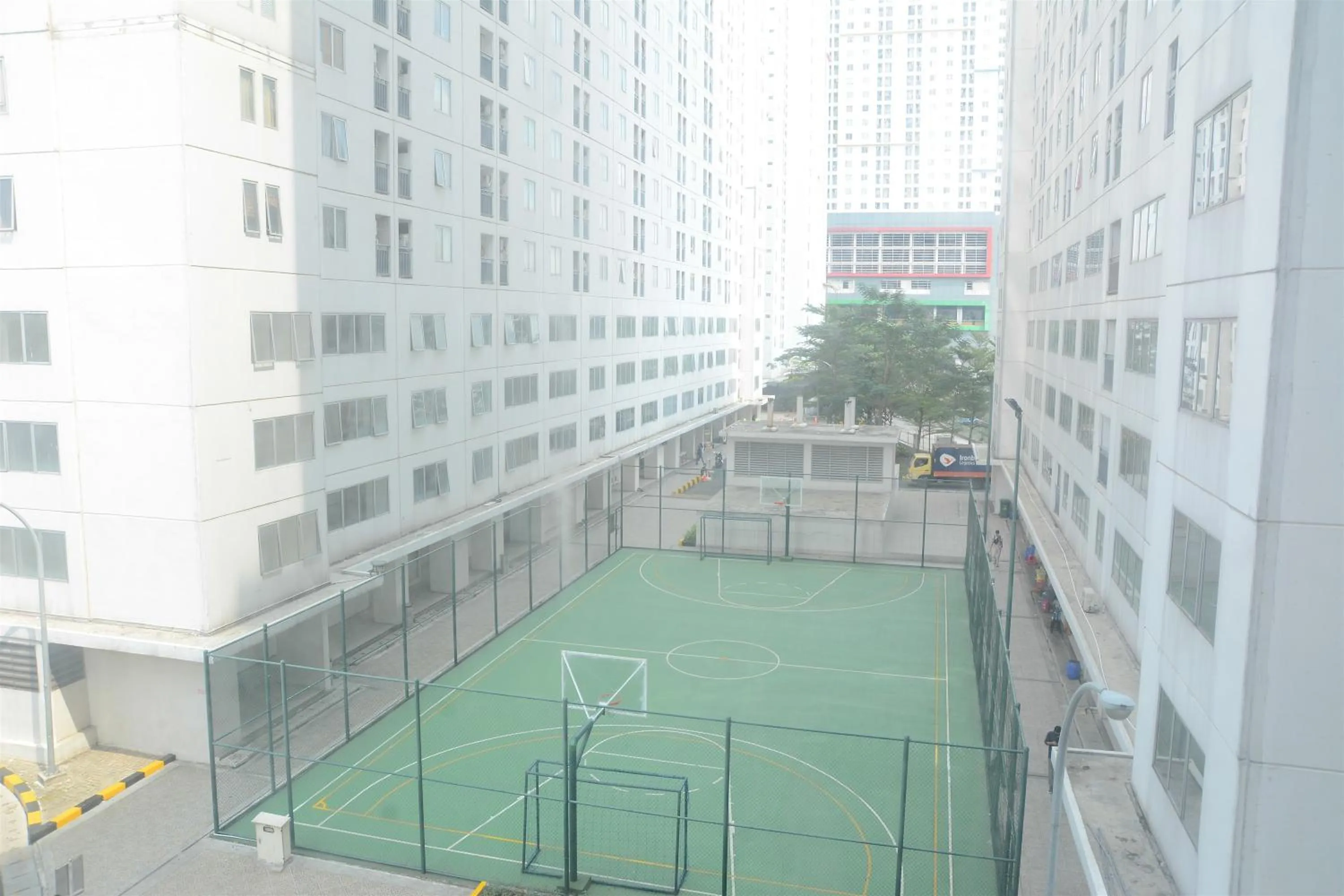 Property building in Best Deal 3BR Apartment Bassura City near Shopping Center By Travelio