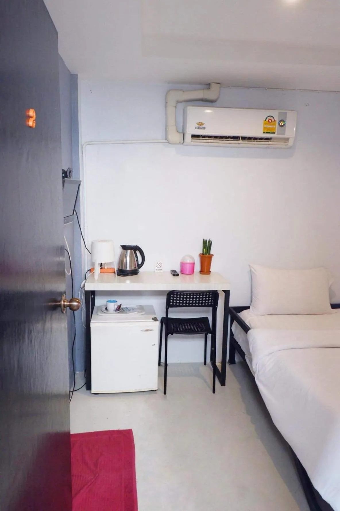 Bed in Rin GuestHouse Pracharak RD