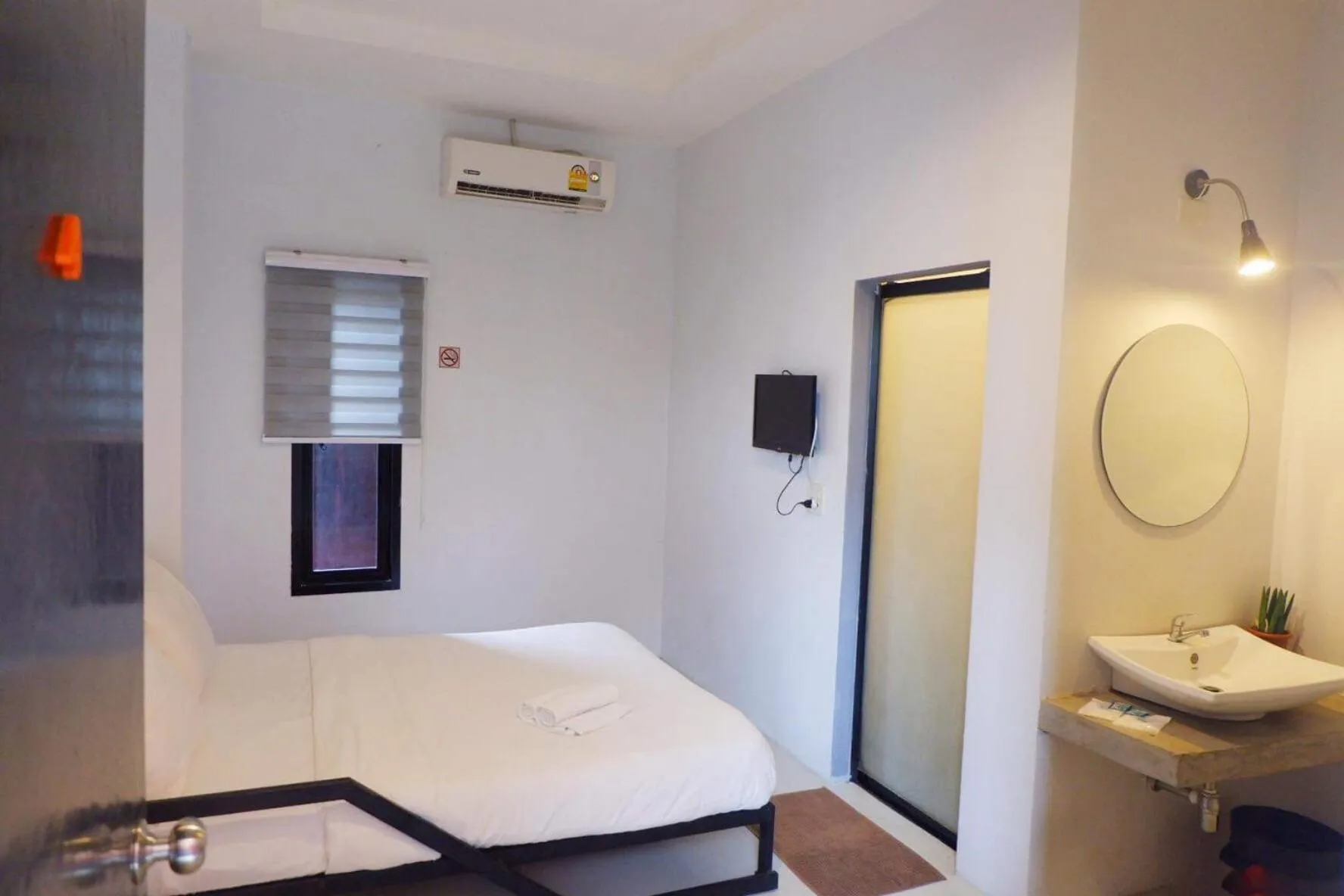 Bed in Rin GuestHouse Pracharak RD