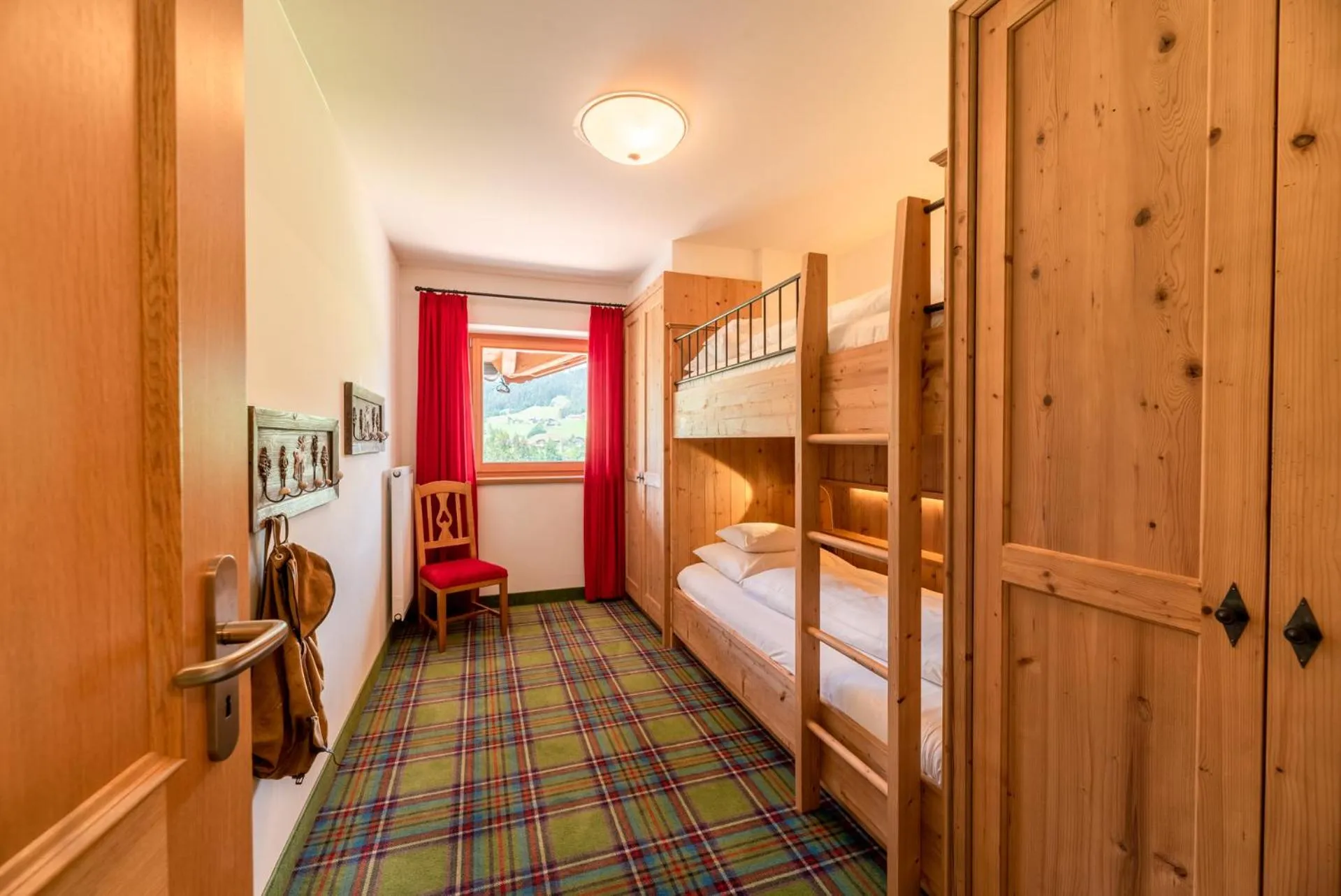 Bed in Relais & Châteaux Gut Steinbach Hotel Chalets SPA