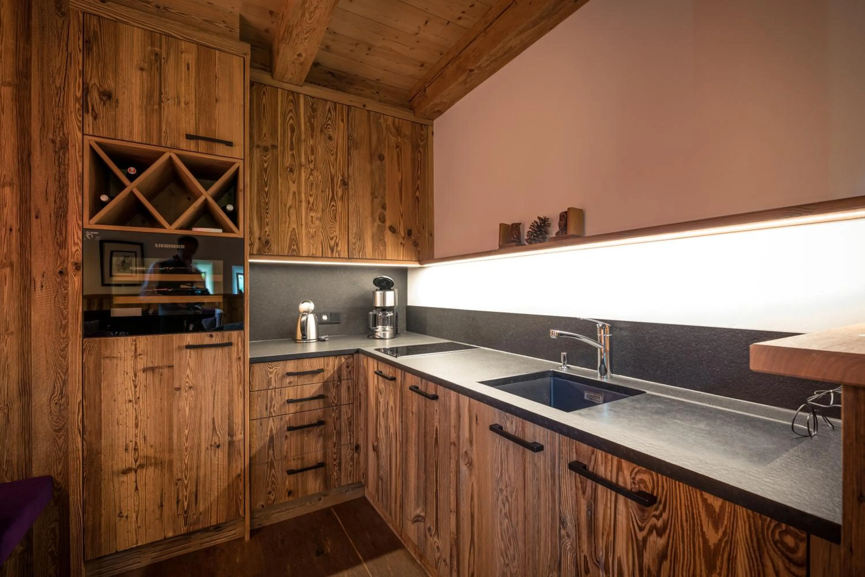 Kitchen or kitchenette in Relais & Châteaux Gut Steinbach Hotel Chalets SPA
