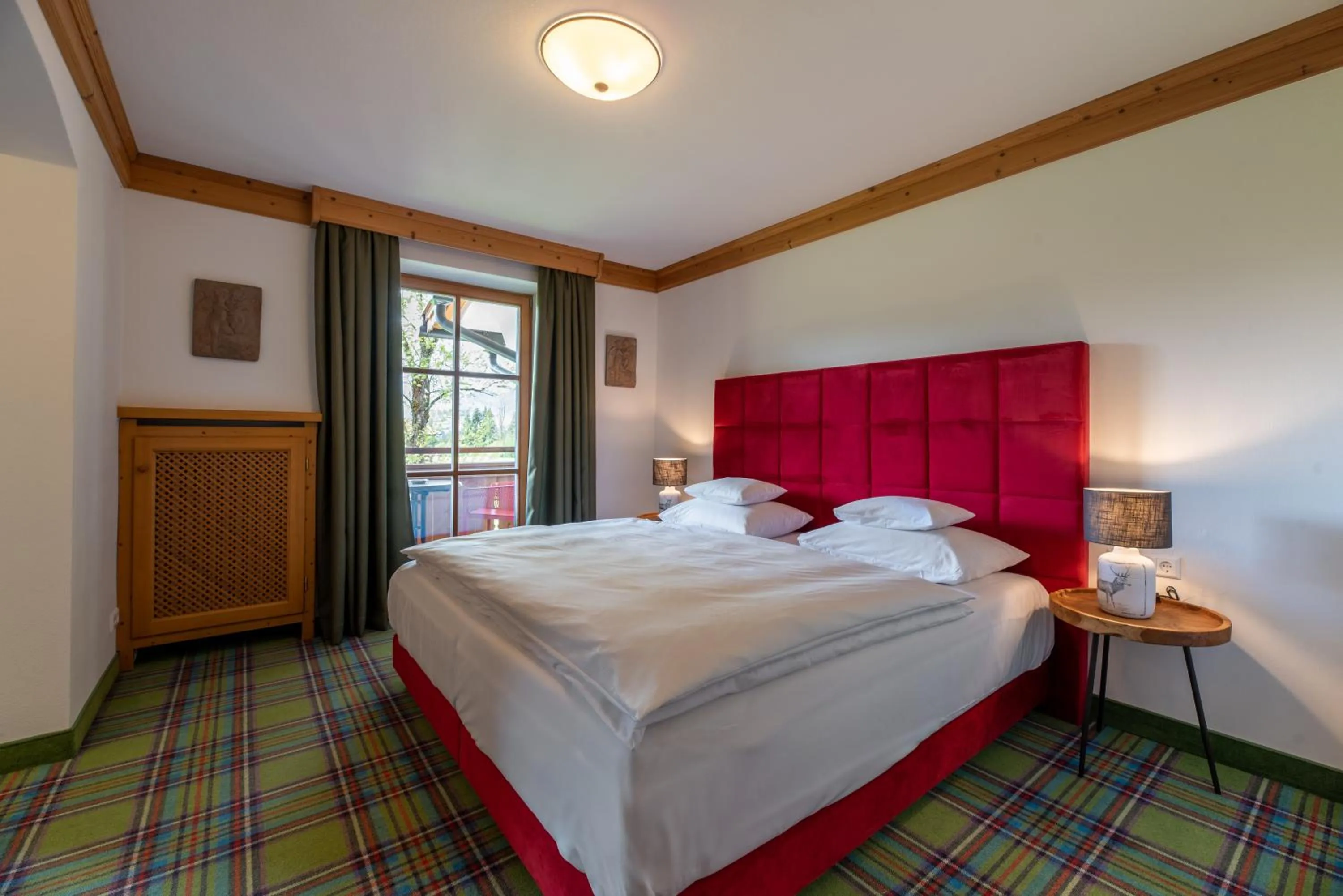 Bed in Relais & Châteaux Gut Steinbach Hotel Chalets SPA