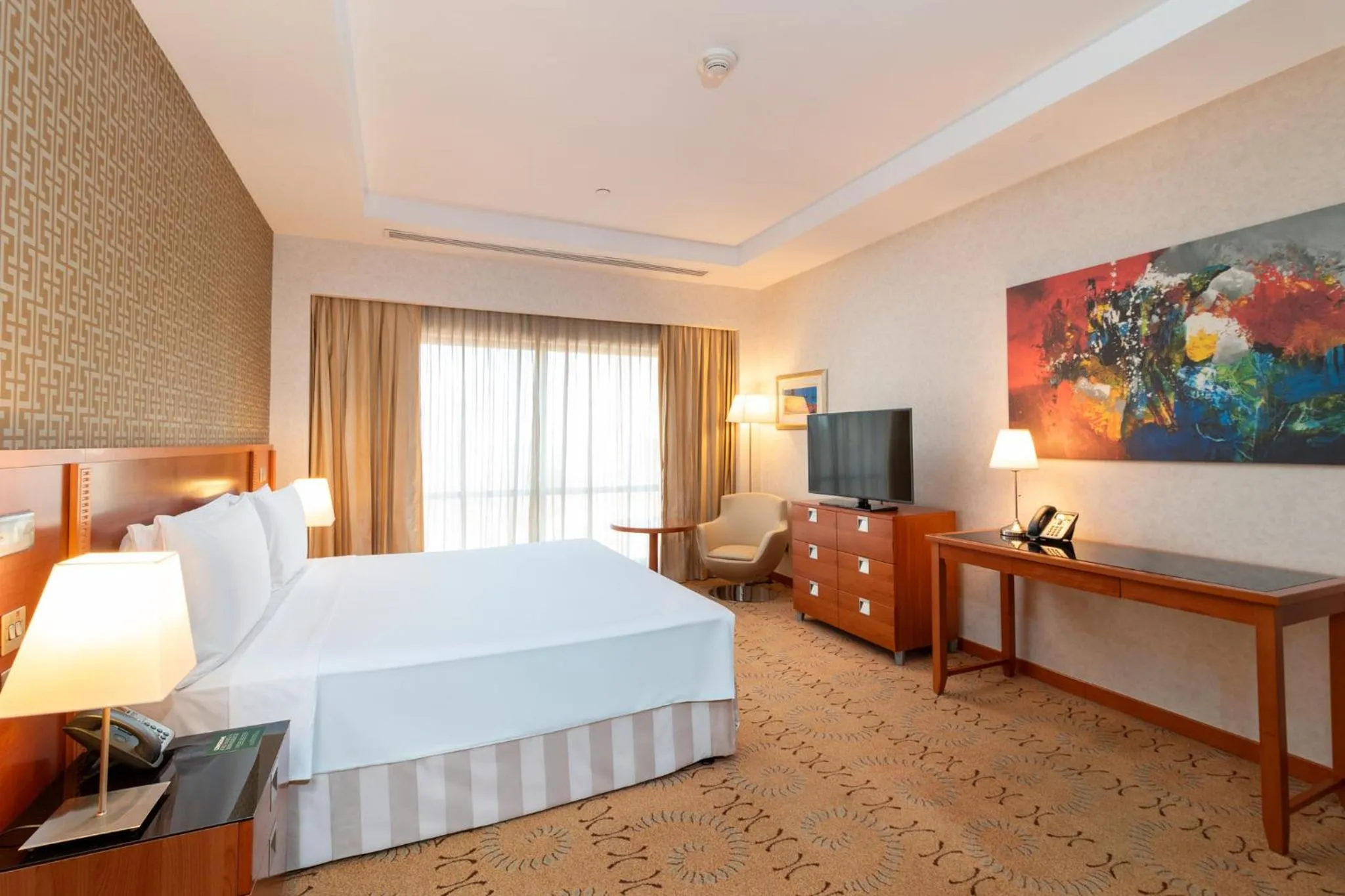 Photo of the whole room, Bed in Holiday Inn - Suites Kuwait Salmiya by IHG