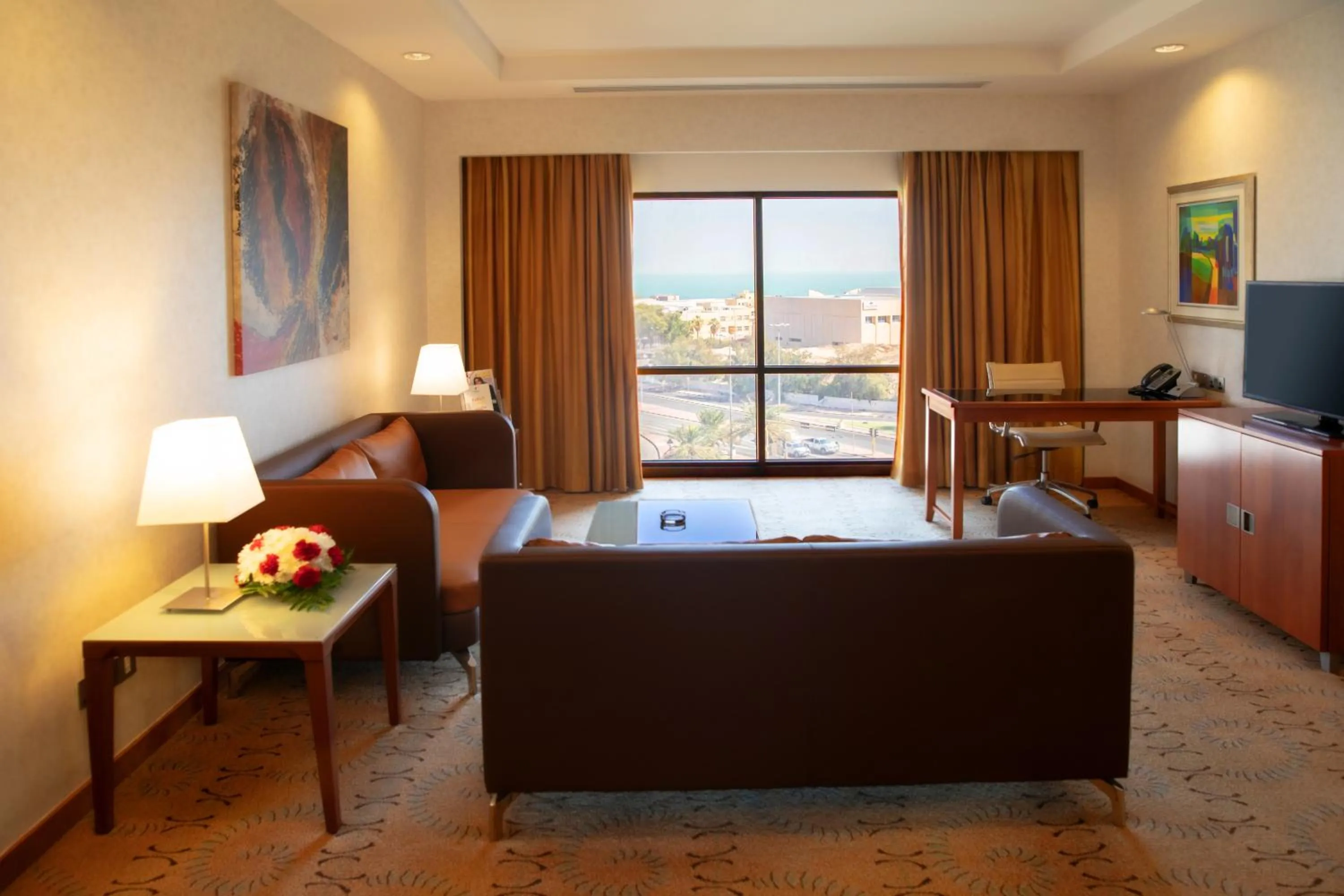 Living room in Holiday Inn - Suites Kuwait Salmiya by IHG