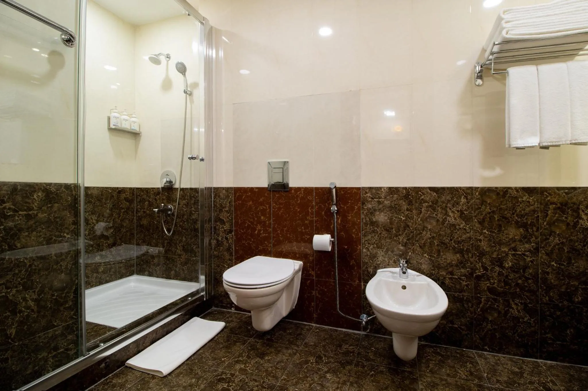 Bathroom in Holiday Inn - Suites Kuwait Salmiya by IHG