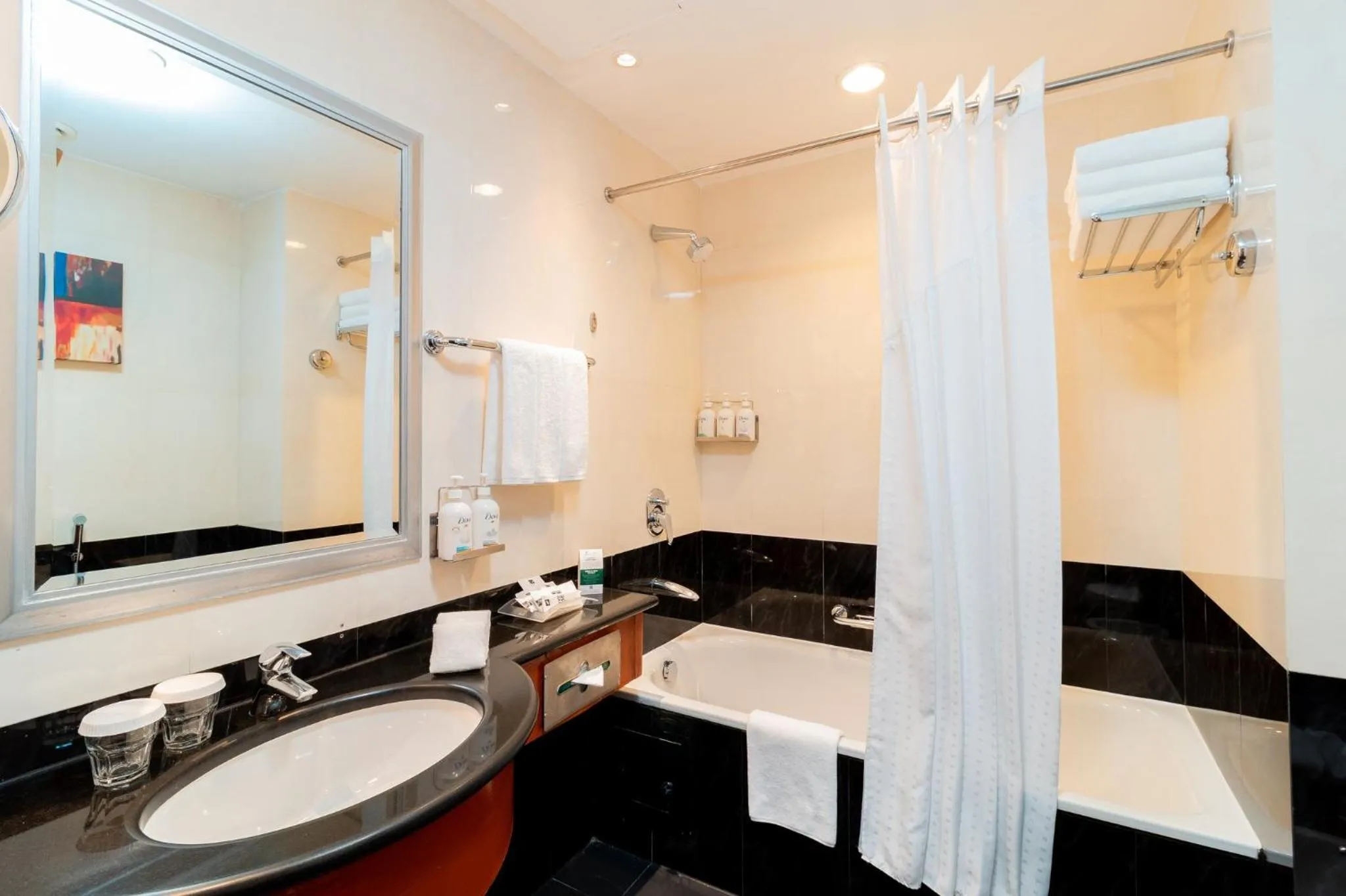 Bathroom in Holiday Inn - Suites Kuwait Salmiya by IHG