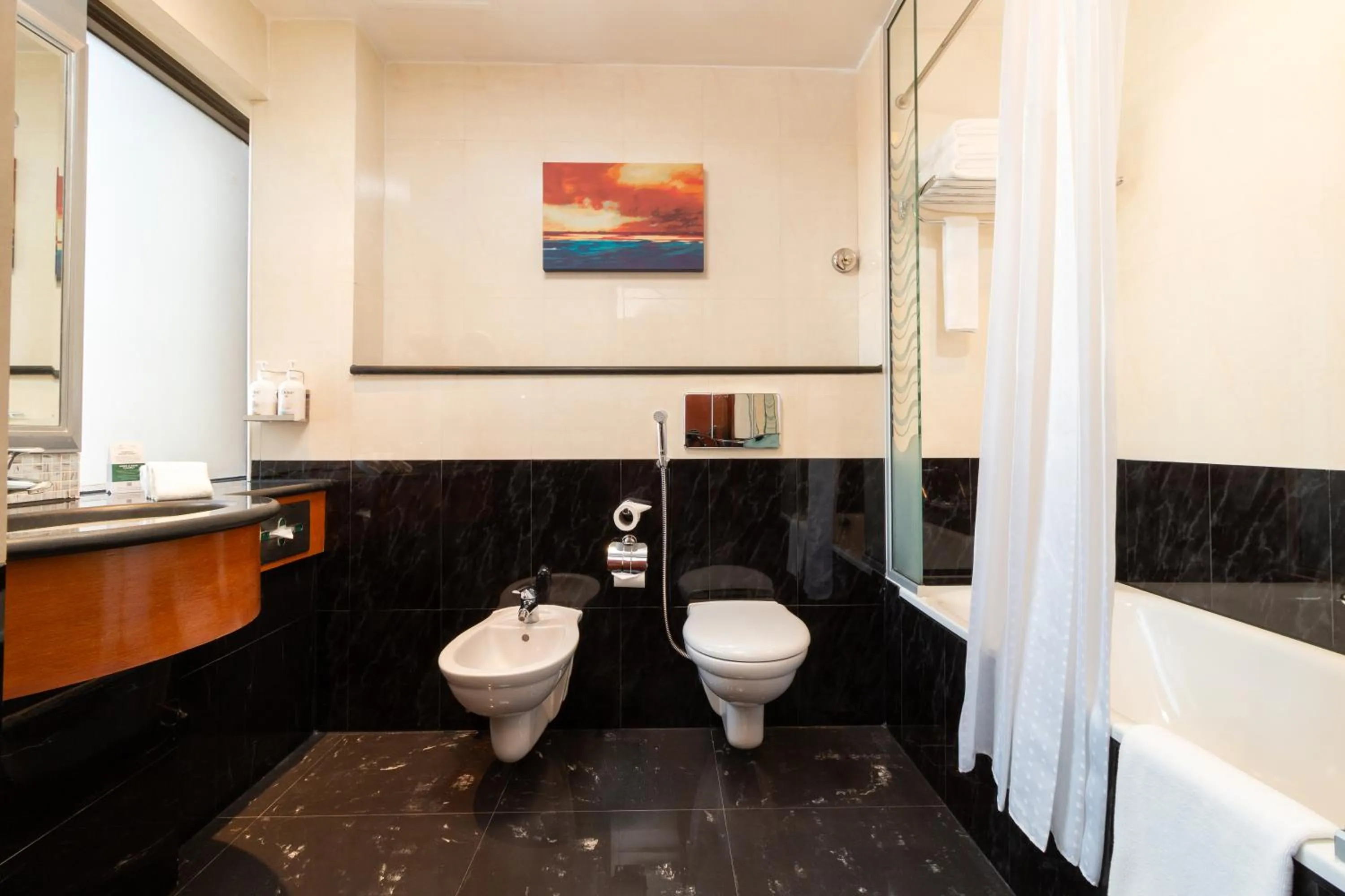 Shower in Holiday Inn - Suites Kuwait Salmiya by IHG