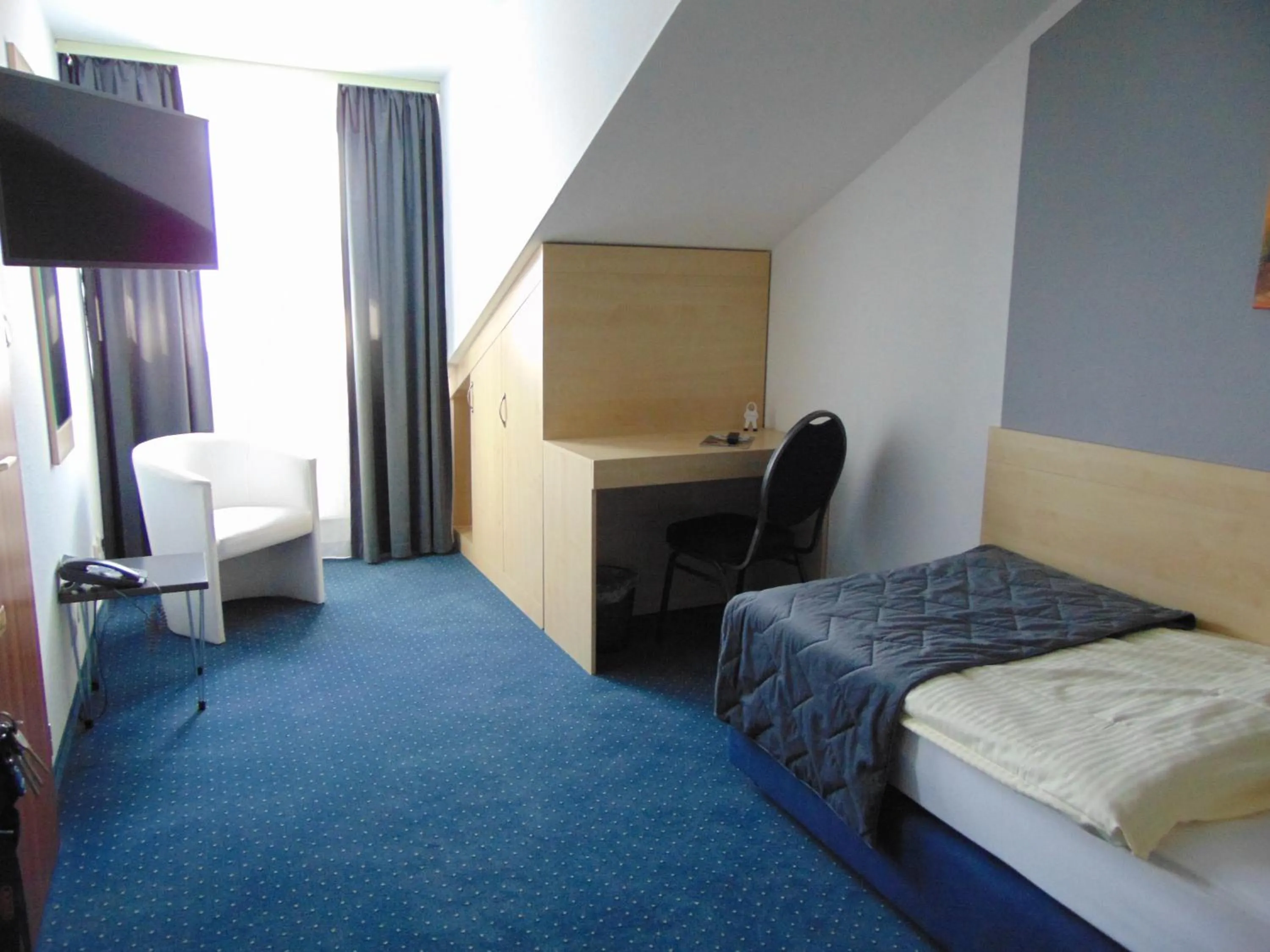 Photo of the whole room, Bed in Hotel Restaurant Molitor