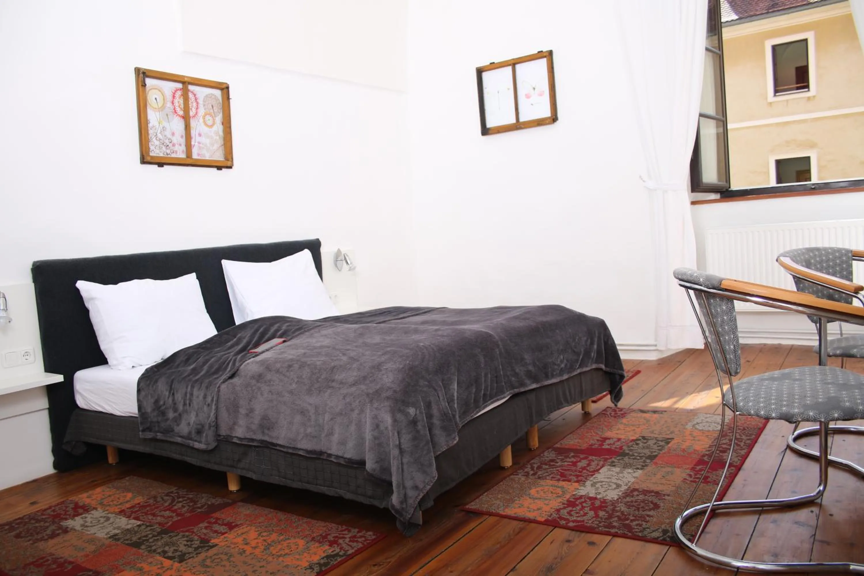 Bed in Hotel im Stift Neuberg