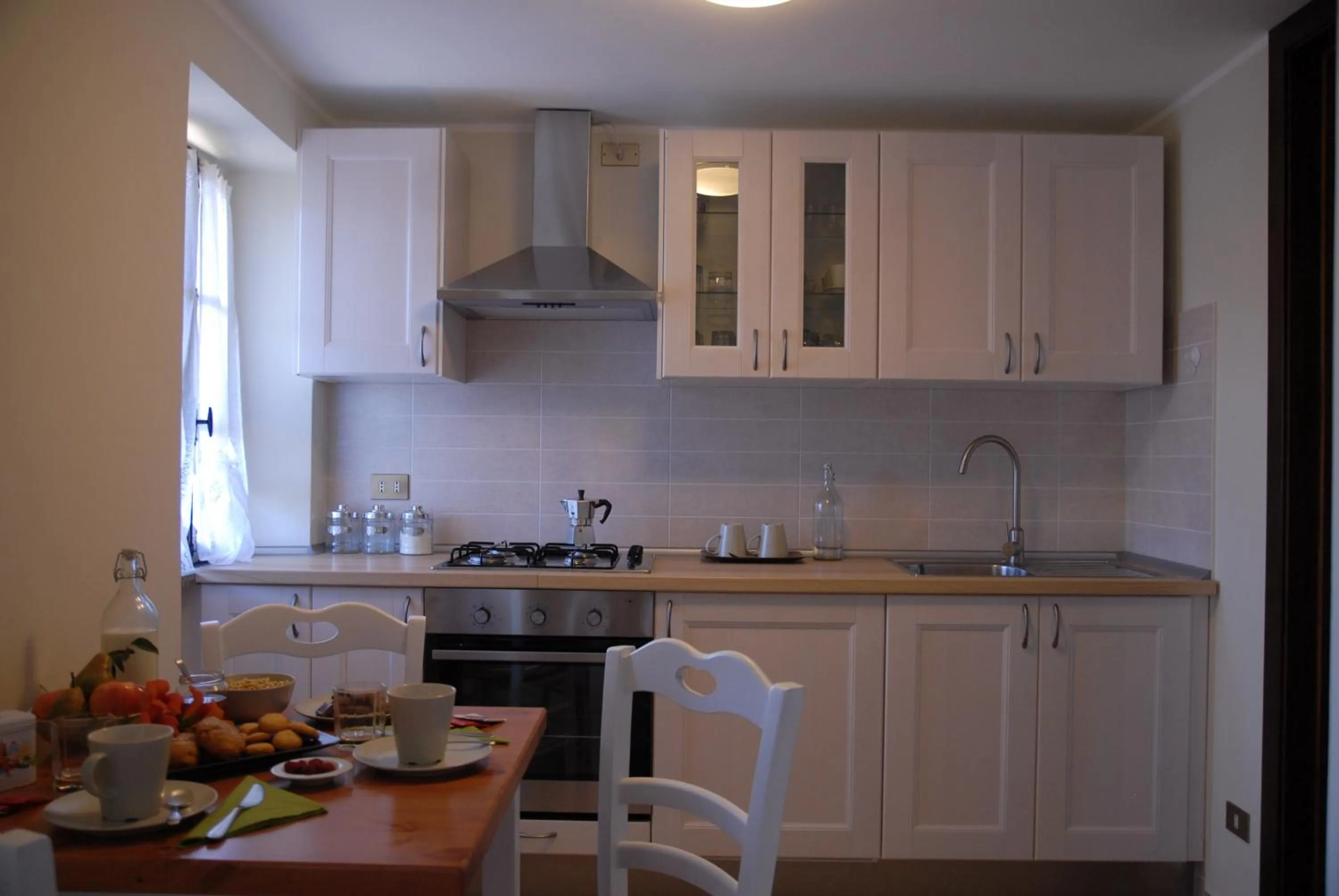 Communal kitchen in Bed & Breakfast Castello Regina