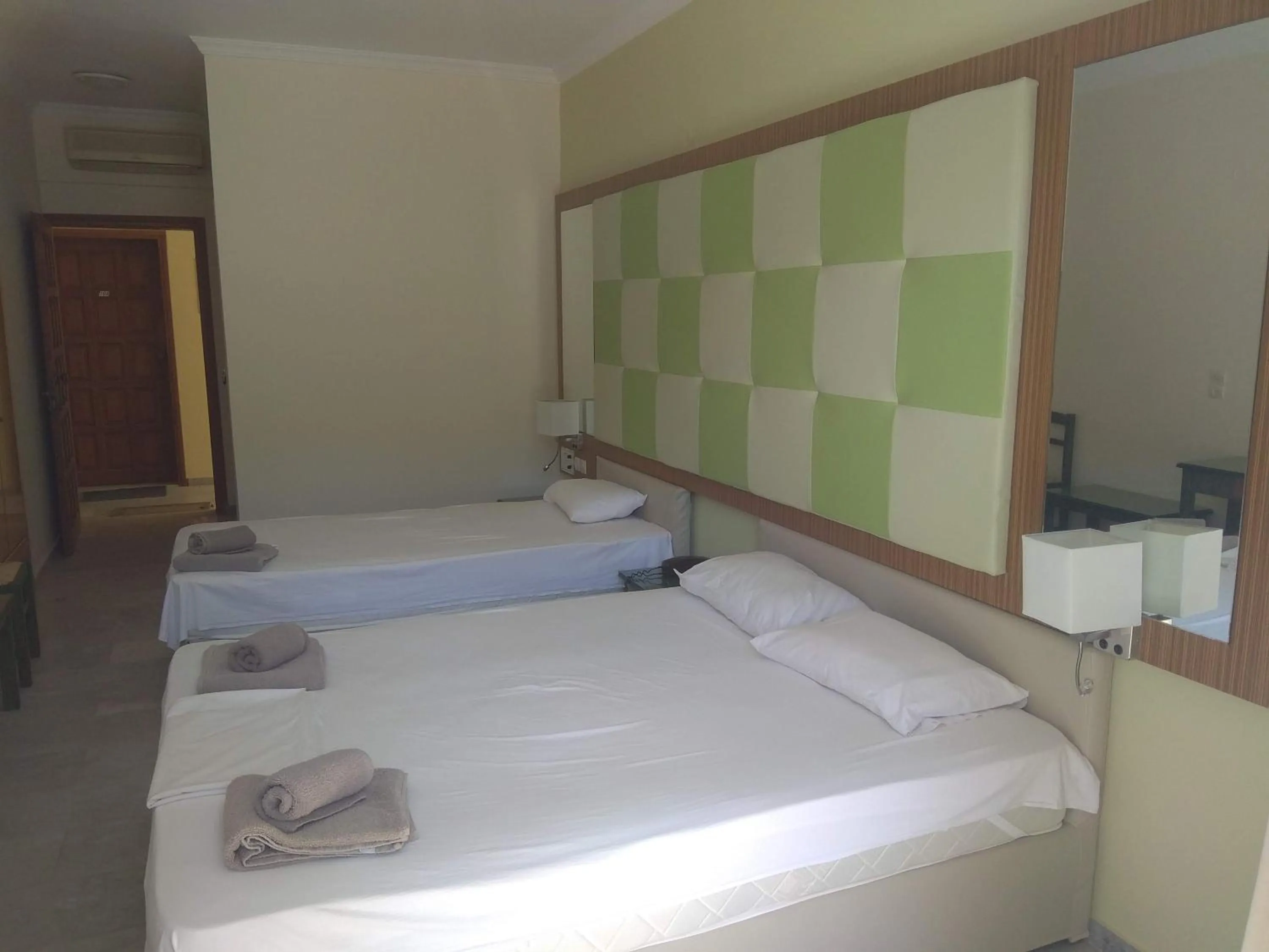 Bed in Kyriaki Hotel