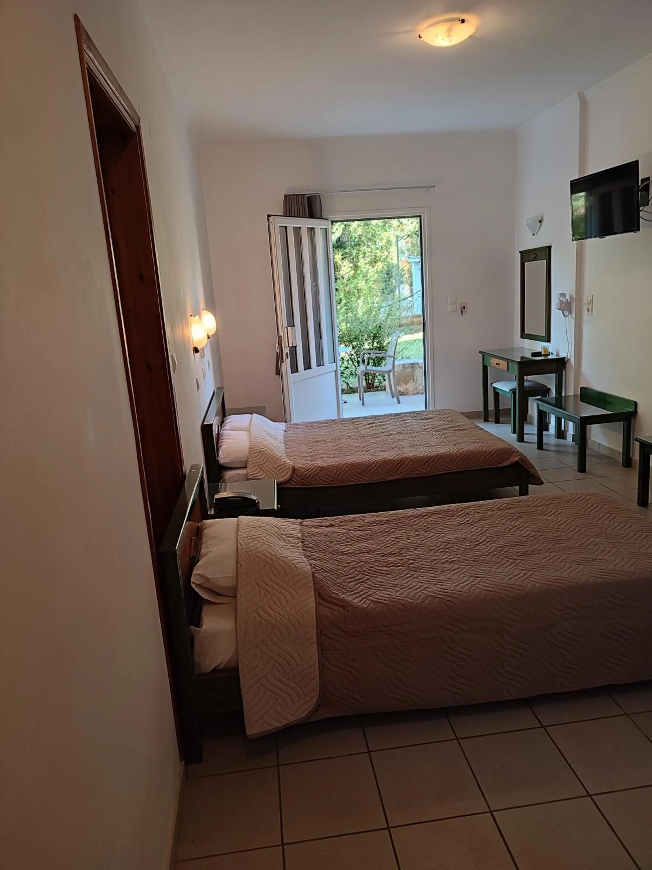 Bed in Kyriaki Hotel