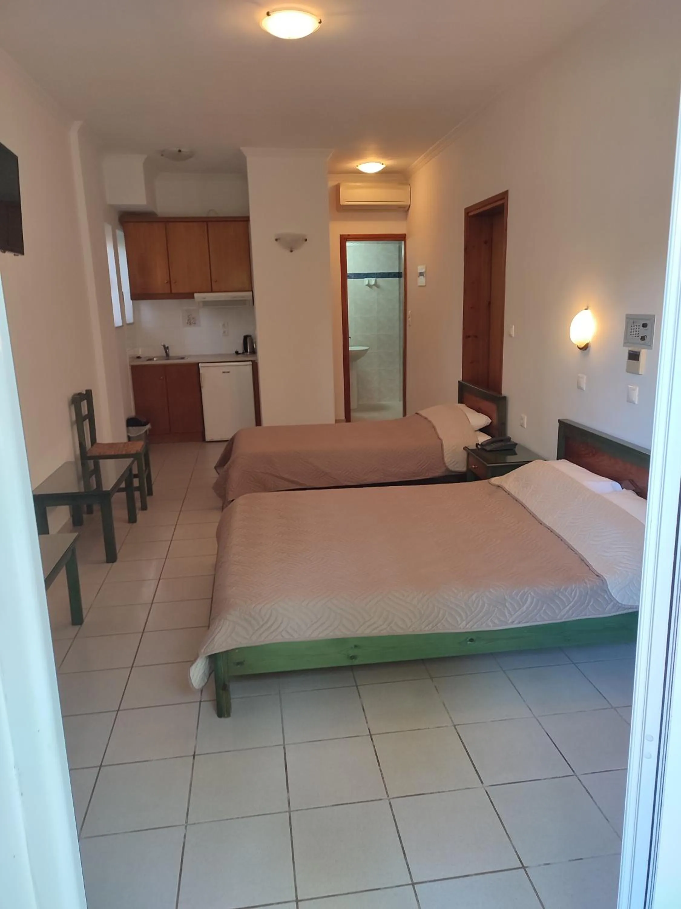 Bed in Kyriaki Hotel