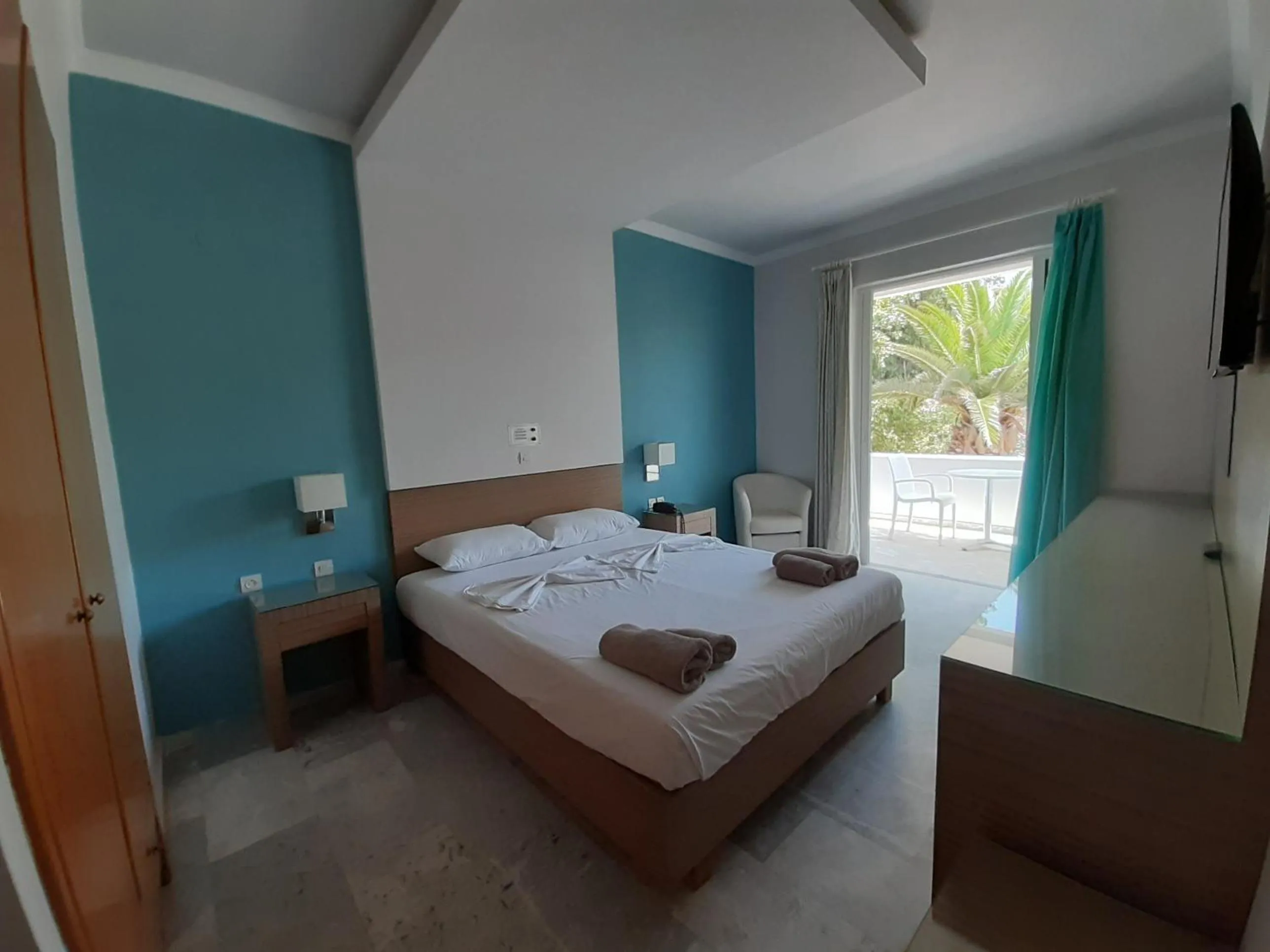 Bed in Kyriaki Hotel